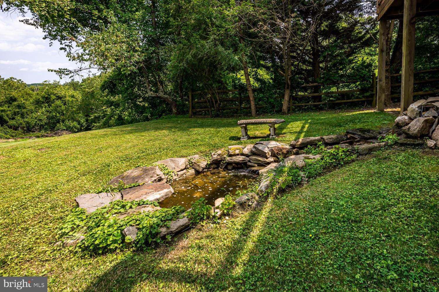 3931 Hunter Road Ellicott City, MD 21043 - Photo 39 of 50 Pond adds a touch of home to this house