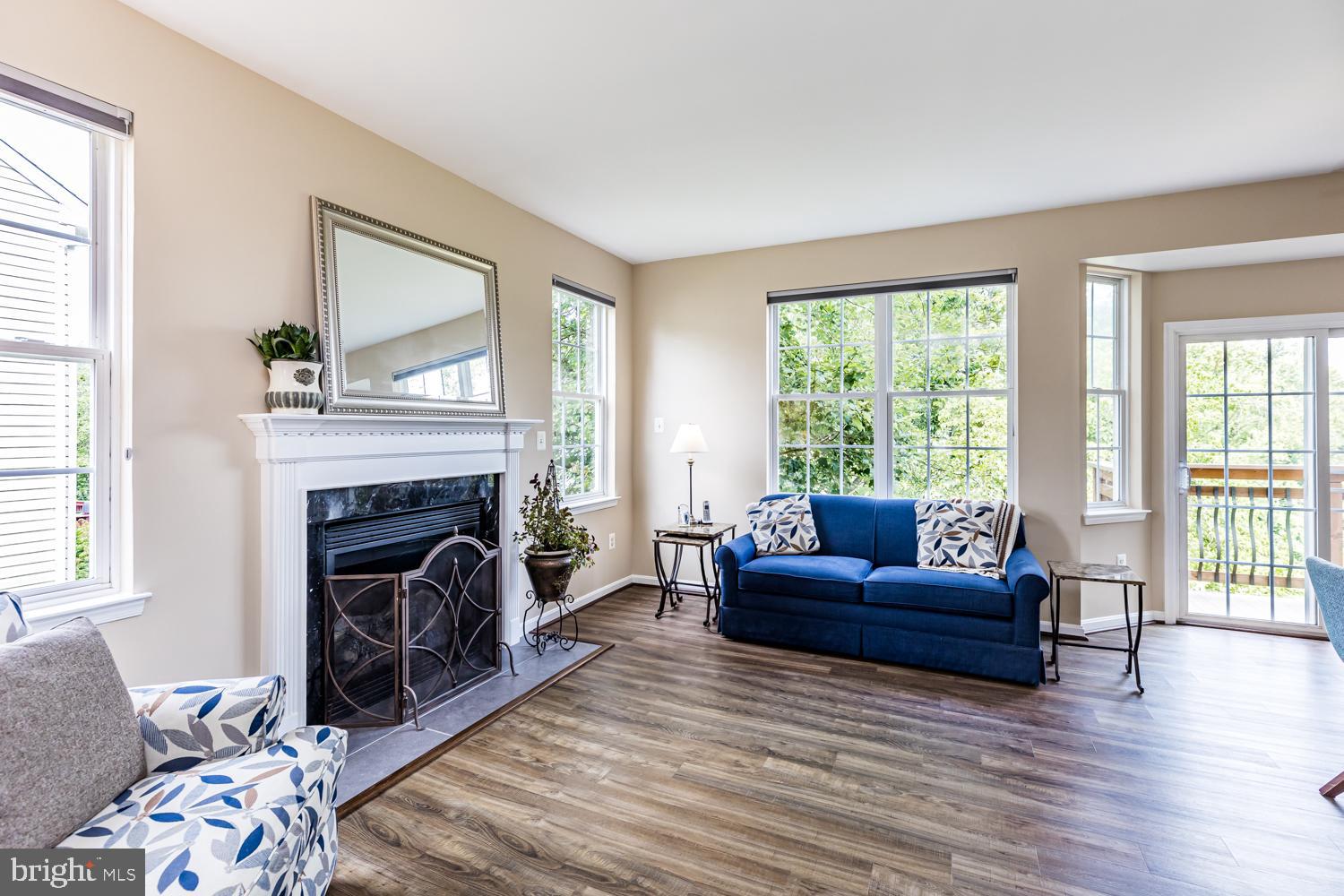 3931 Hunter Road Ellicott City, MD 21043 - Photo 8 of 50 Gather Family room that's bright w/ gas FP