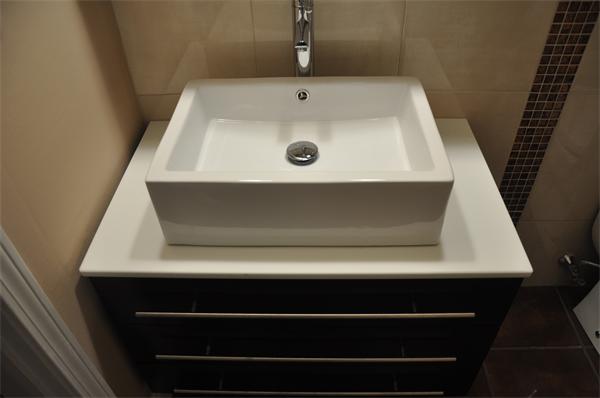 9 Washburn Terrace, Unit 2 Brookline, MA 02446 - Photo 8 of 9 a bathroom with a sink