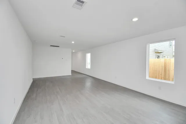 an empty room with windows