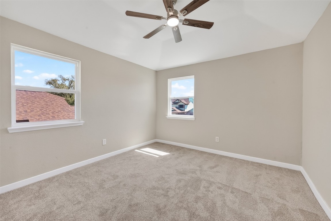 2318 Irish Spring Drive Houston, TX 77067 - Photo 24 of 25 a view of an empty room with a window