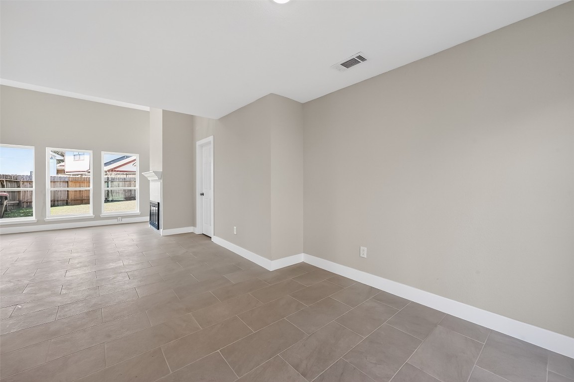 2318 Irish Spring Drive Houston, TX 77067 - Photo 6 of 25 a view of an empty room with a window