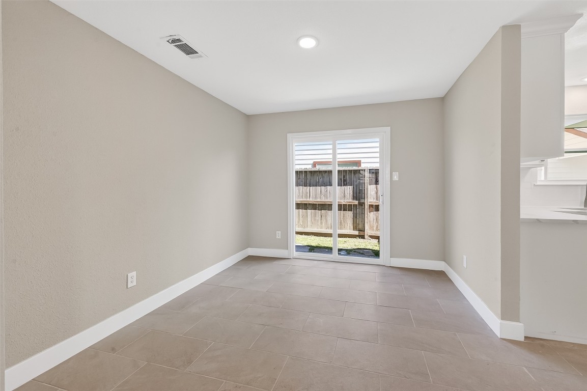 2318 Irish Spring Drive Houston, TX 77067 - Photo 7 of 25 an empty room with windows