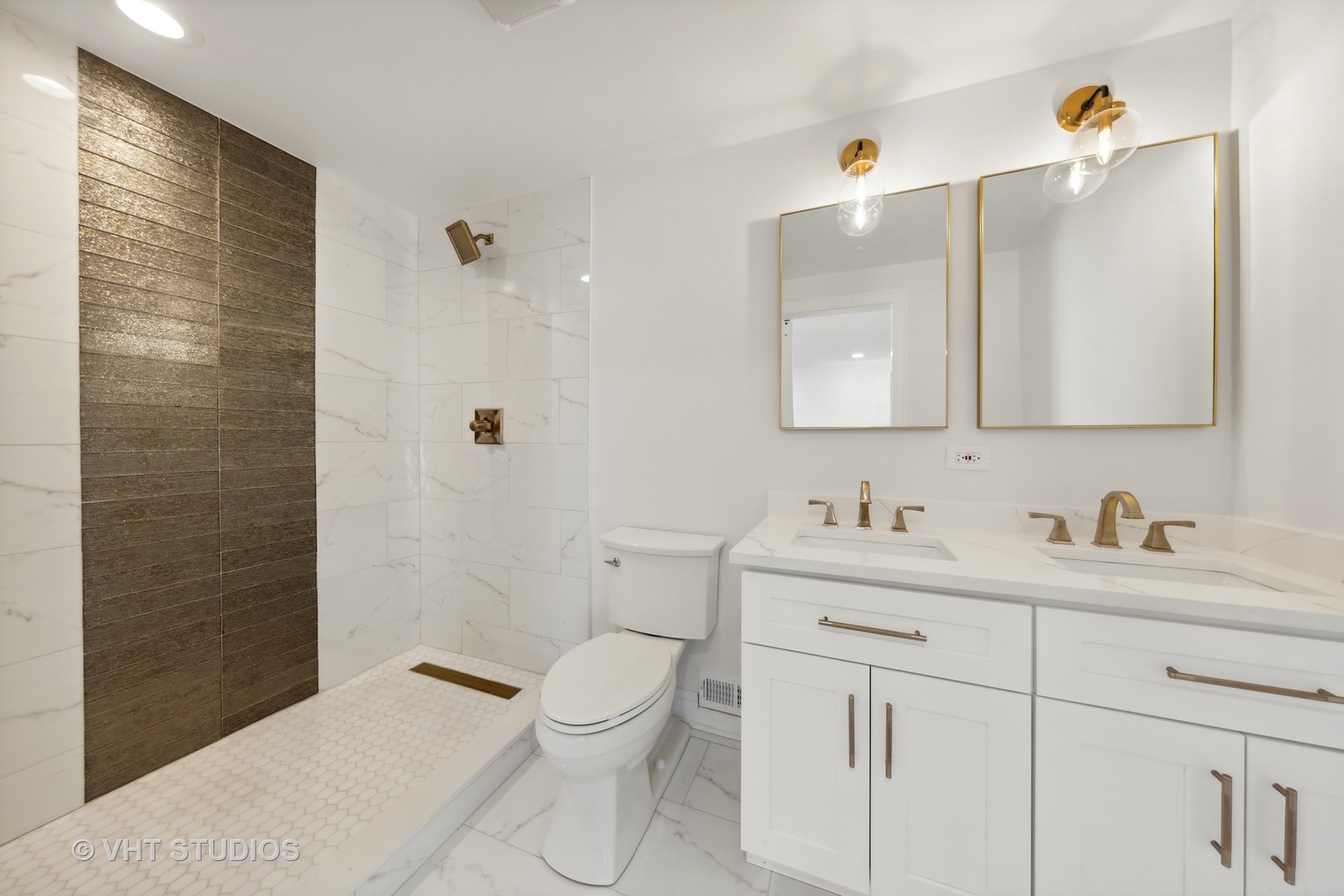 771 Swain Avenue Elmhurst, IL 60126 - Photo 20 of 43 a bathroom with a toilet a sink a mirror a shower a vanity and window