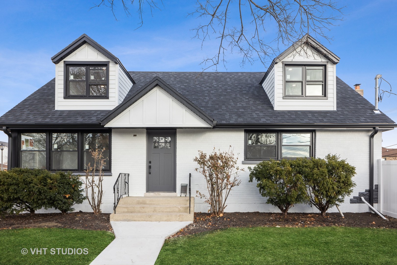 771 Swain Avenue Elmhurst, IL 60126 - Photo 2 of 43 a front view of a house with garden