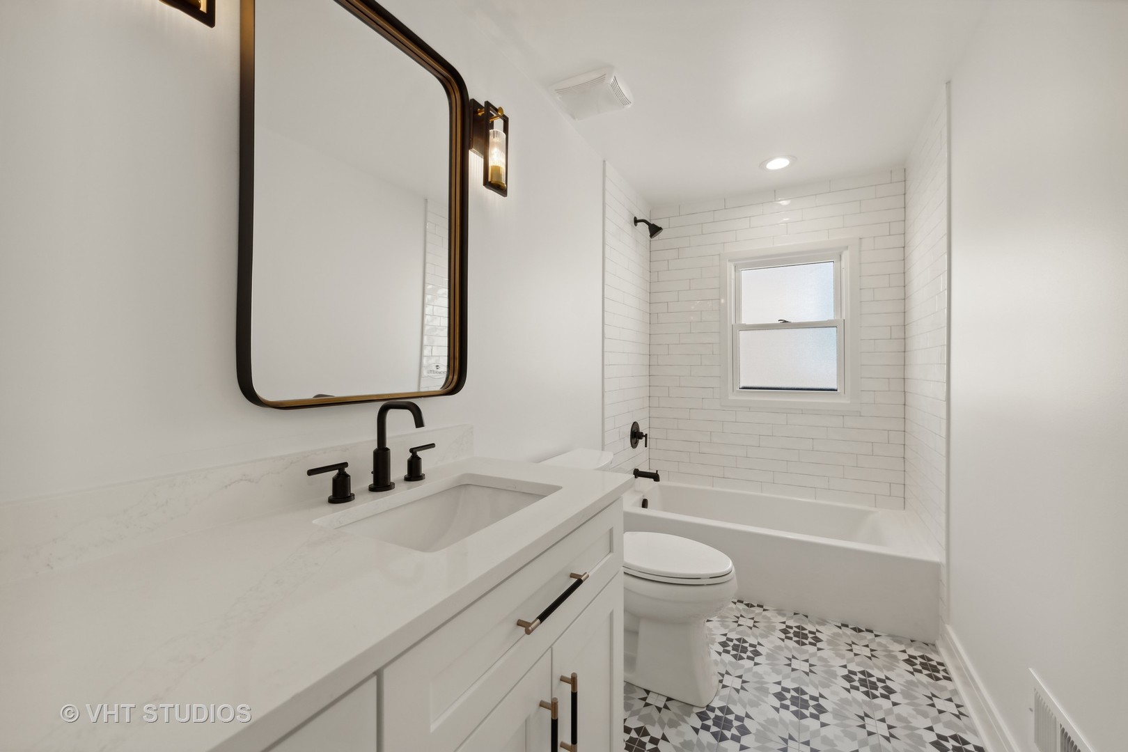 771 Swain Avenue Elmhurst, IL 60126 - Photo 22 of 43 a bathroom with a sink a toilet and shower