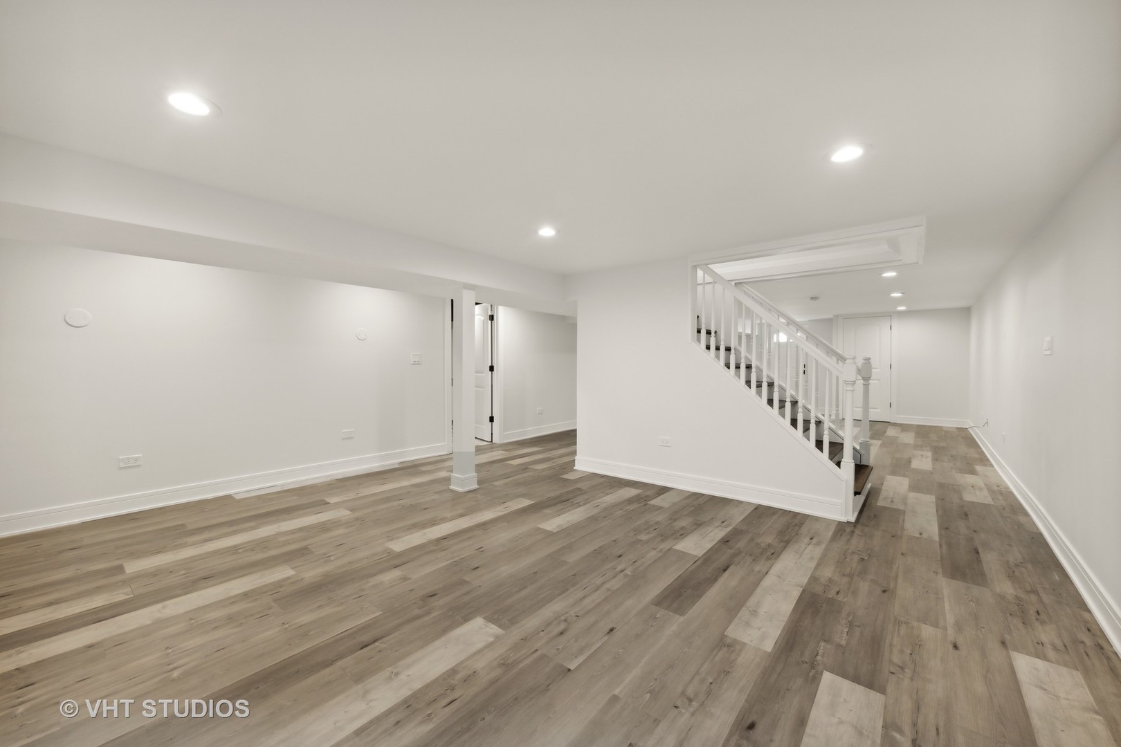 771 Swain Avenue Elmhurst, IL 60126 - Photo 31 of 43 a view of an empty room with wooden floor