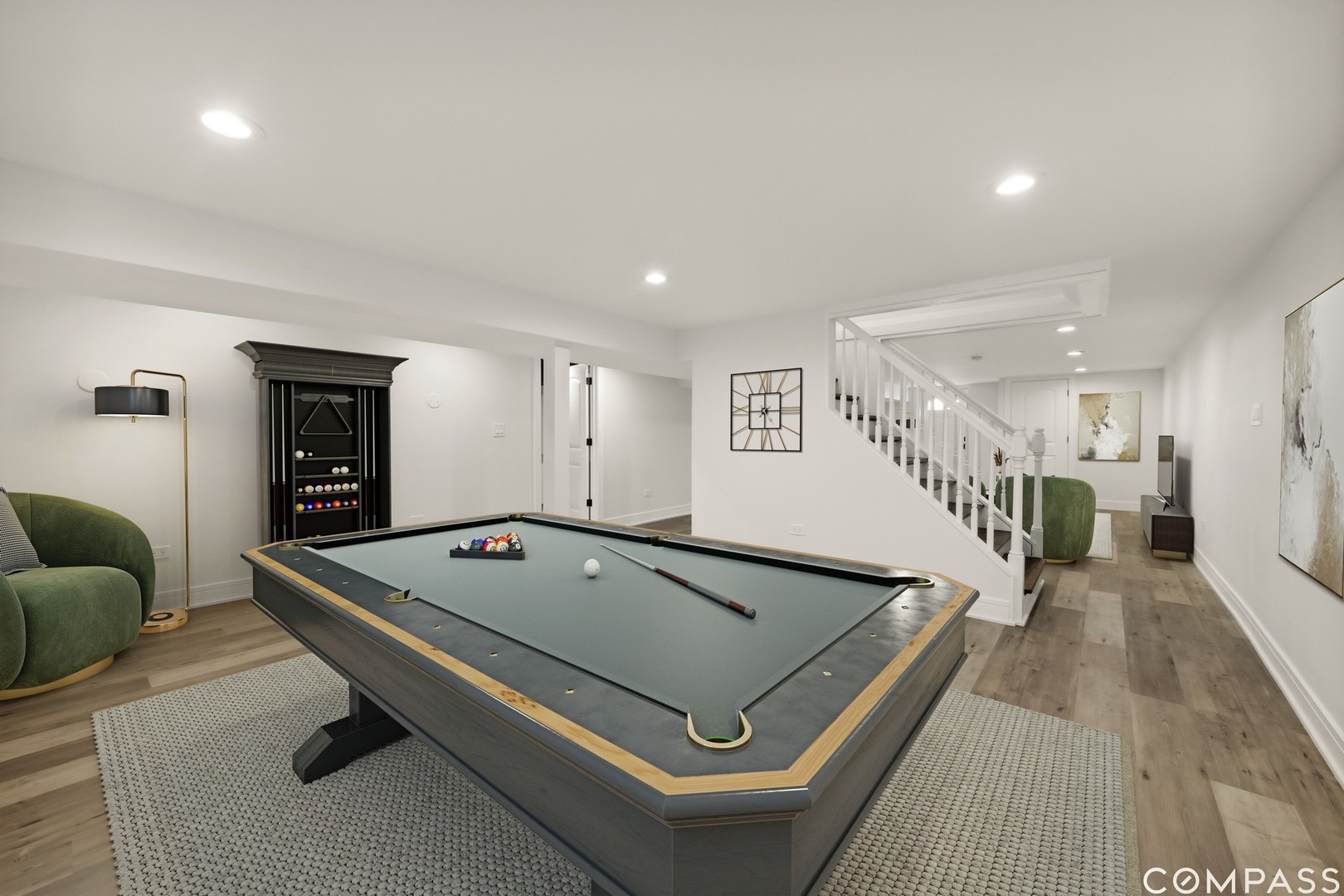 771 Swain Avenue Elmhurst, IL 60126 - Photo 32 of 43 a living room with a table tennis pool table and couches
