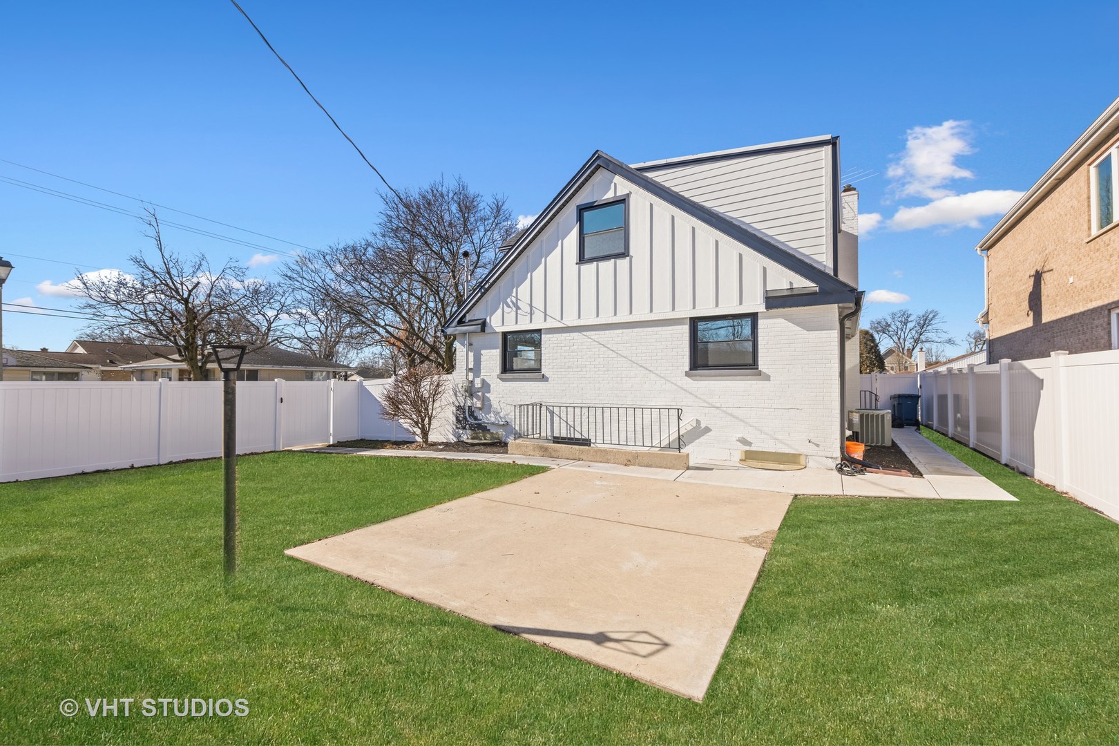 771 Swain Avenue Elmhurst, IL 60126 - Photo 37 of 43 a backyard of a house with table and chairs