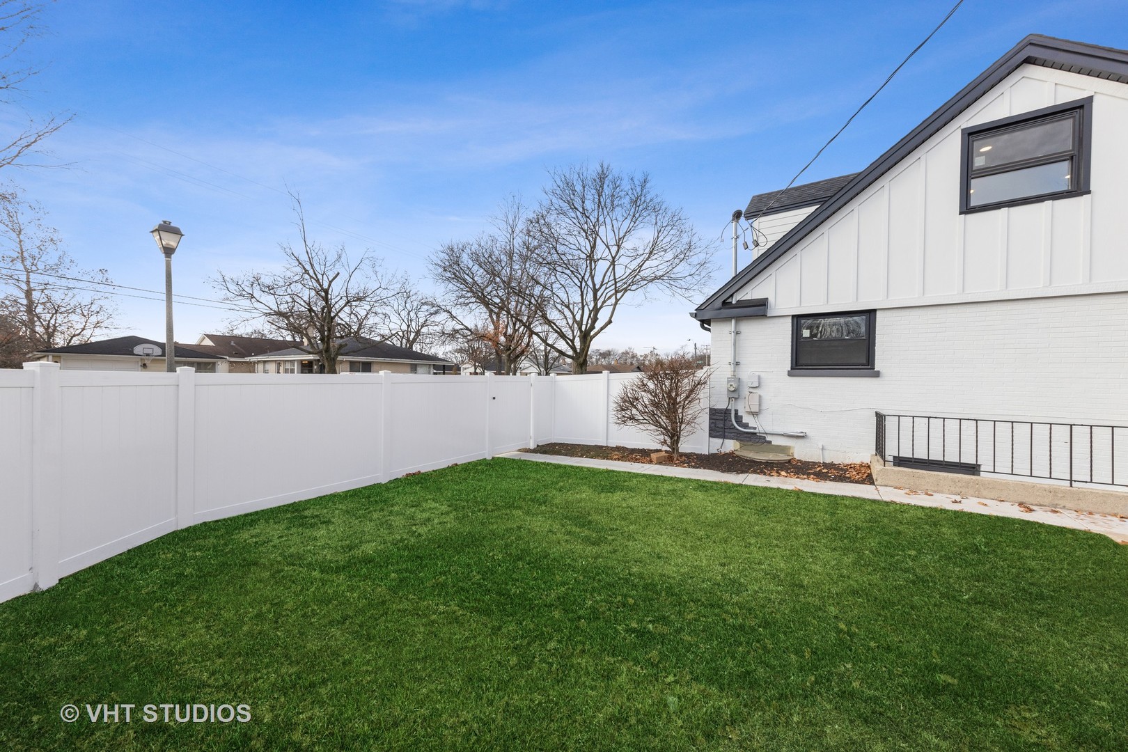 771 Swain Avenue Elmhurst, IL 60126 - Photo 38 of 43 a backyard of a house with table and chairs