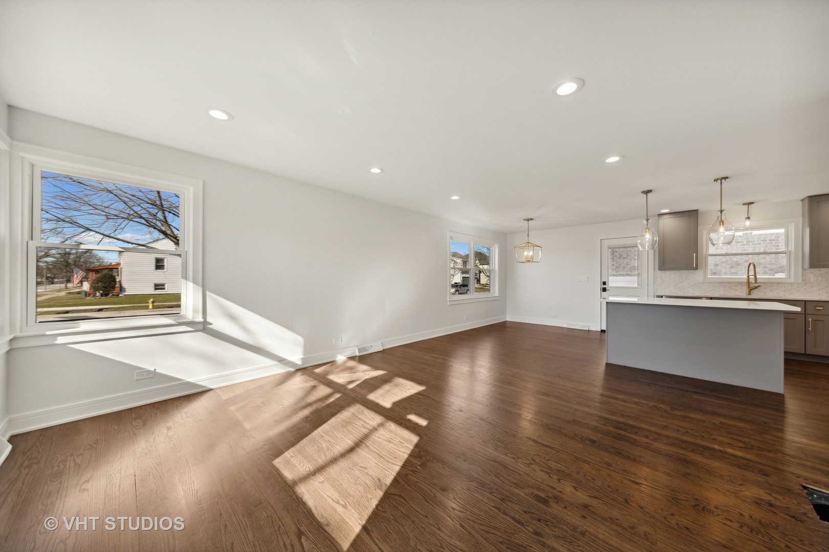 771 Swain Avenue Elmhurst, IL 60126 - Photo 7 of 43 a view of kitchen with cabinets and wooden floor