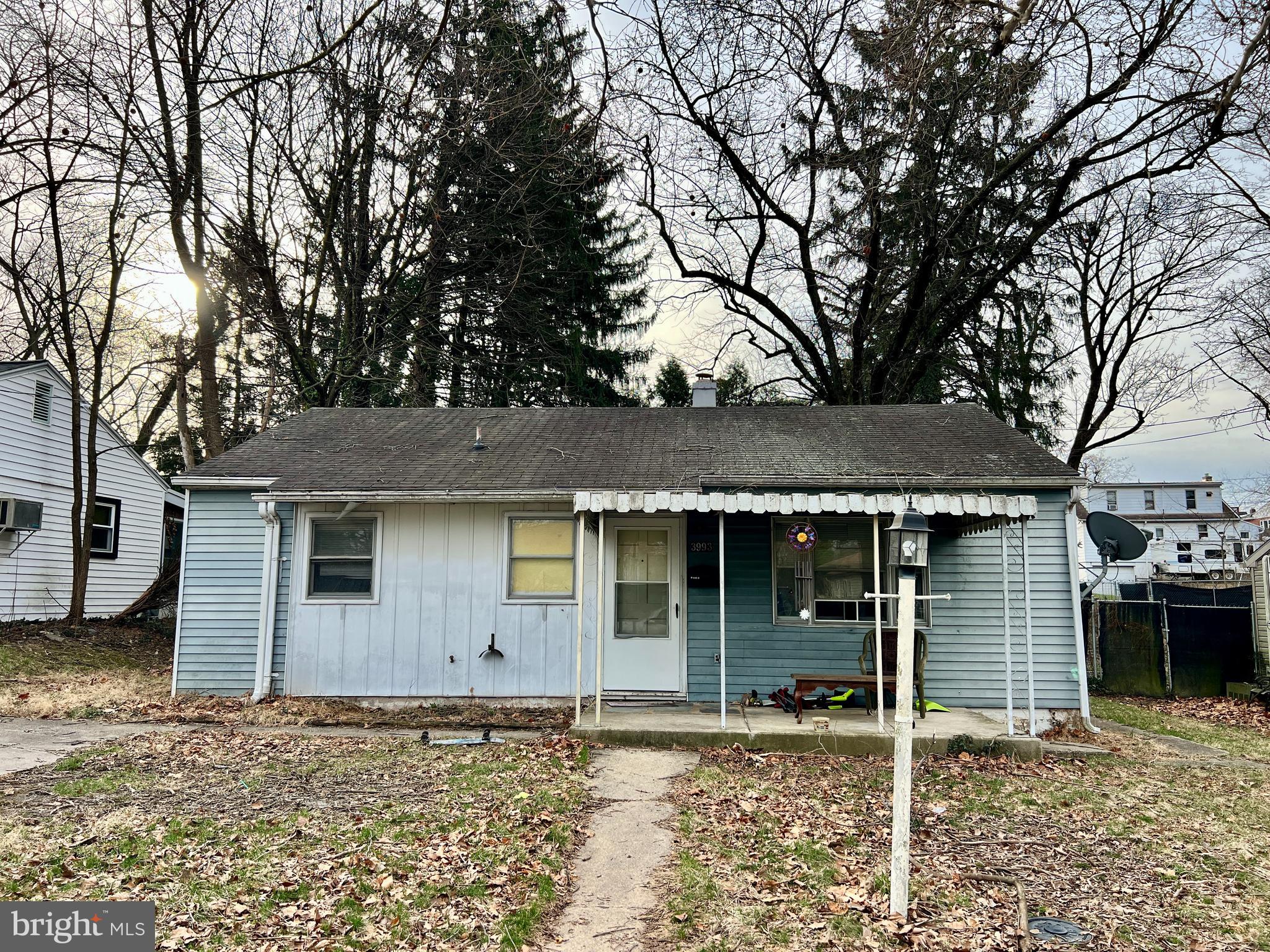 3993 Rauch Street Harrisburg, PA 17109 - Photo 1 of 5 front view of a house with a trees