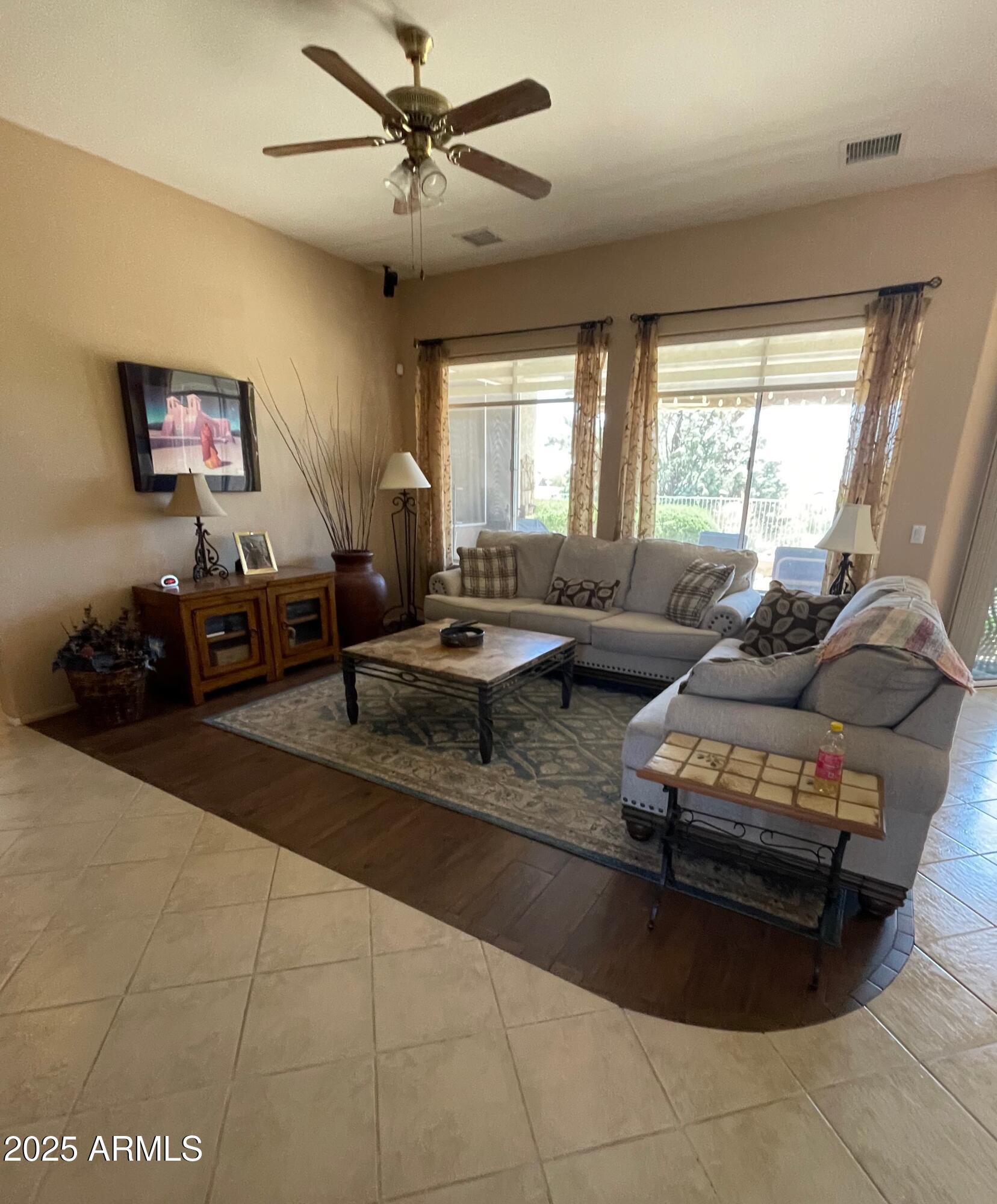 5325 Whisper Ridge Cornville, AZ 86325 - Photo 12 of 54 a living room with furniture and a large window