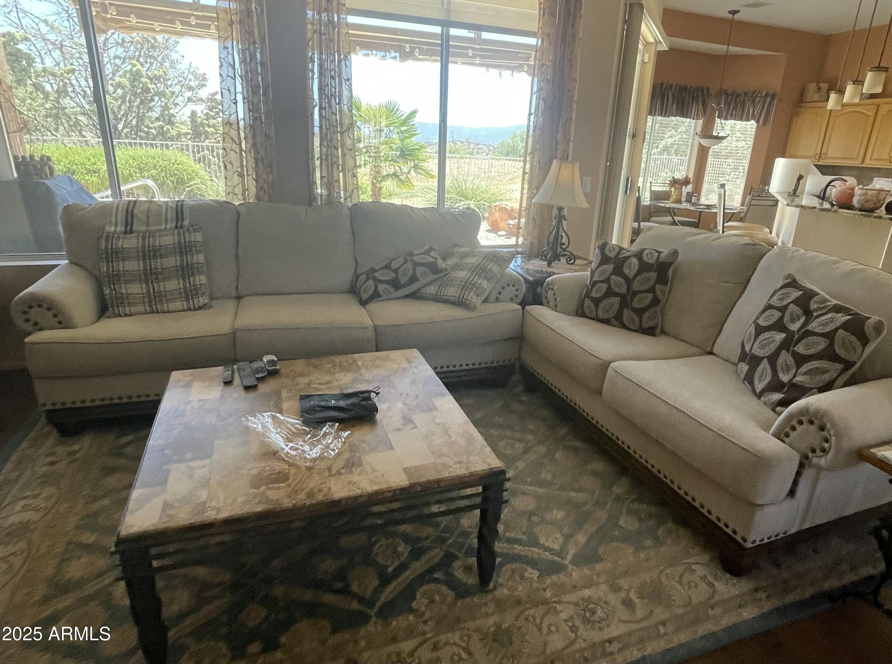 5325 Whisper Ridge Cornville, AZ 86325 - Photo 13 of 54 a living room with furniture and a large window