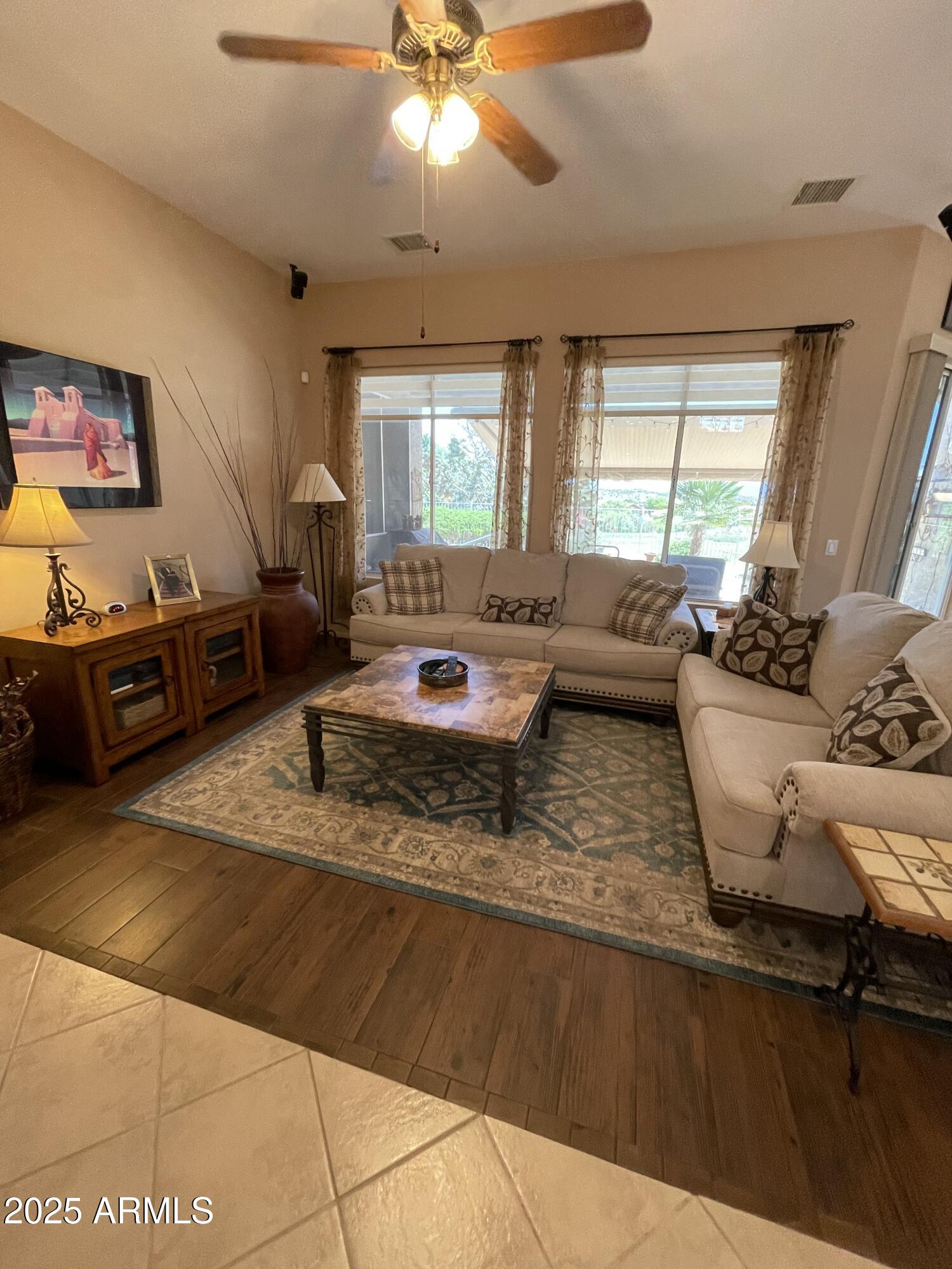 5325 Whisper Ridge Cornville, AZ 86325 - Photo 14 of 54 a living room with furniture and a flat screen tv