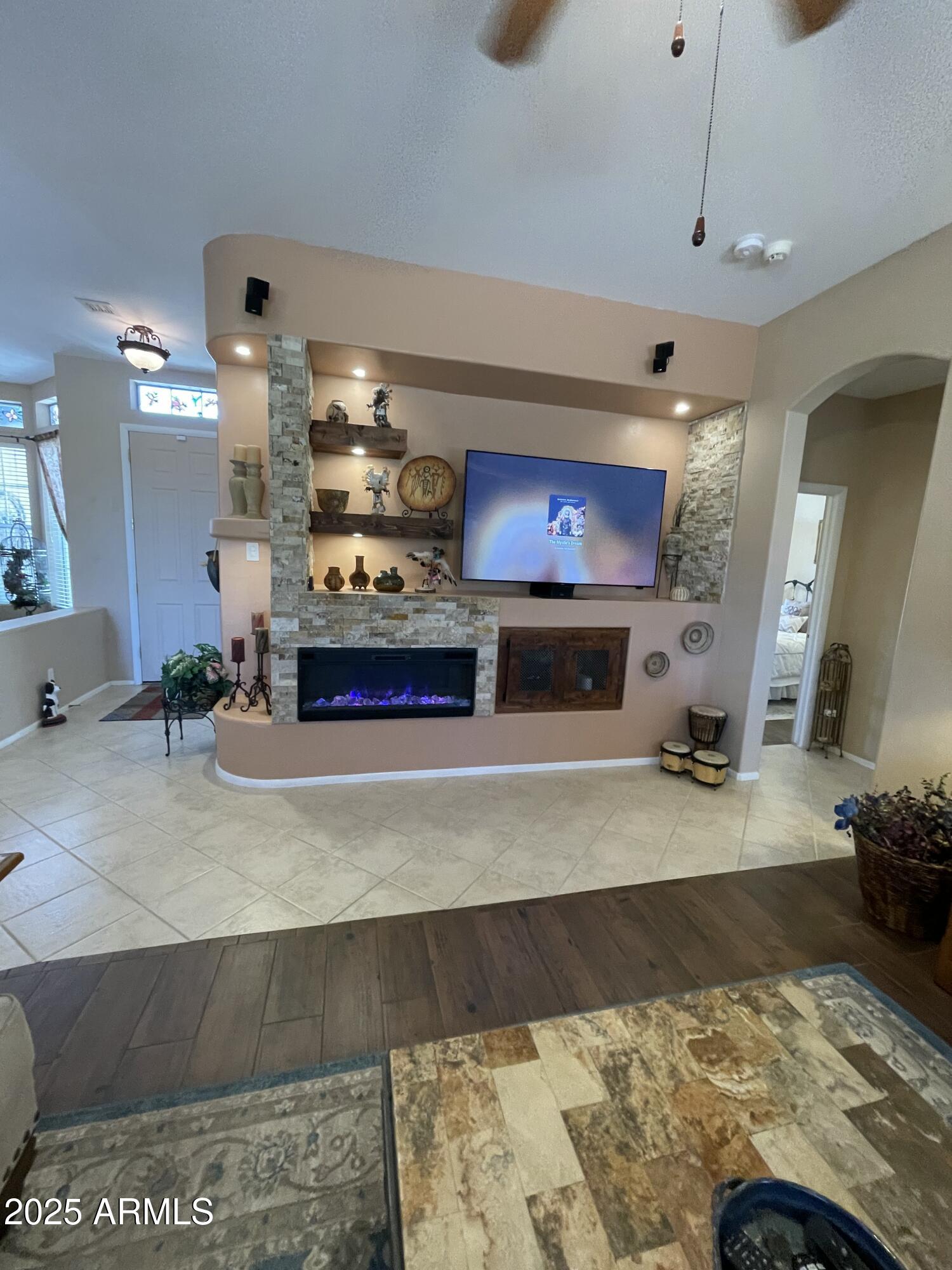 5325 Whisper Ridge Cornville, AZ 86325 - Photo 15 of 54 a living room with furniture and a fireplace