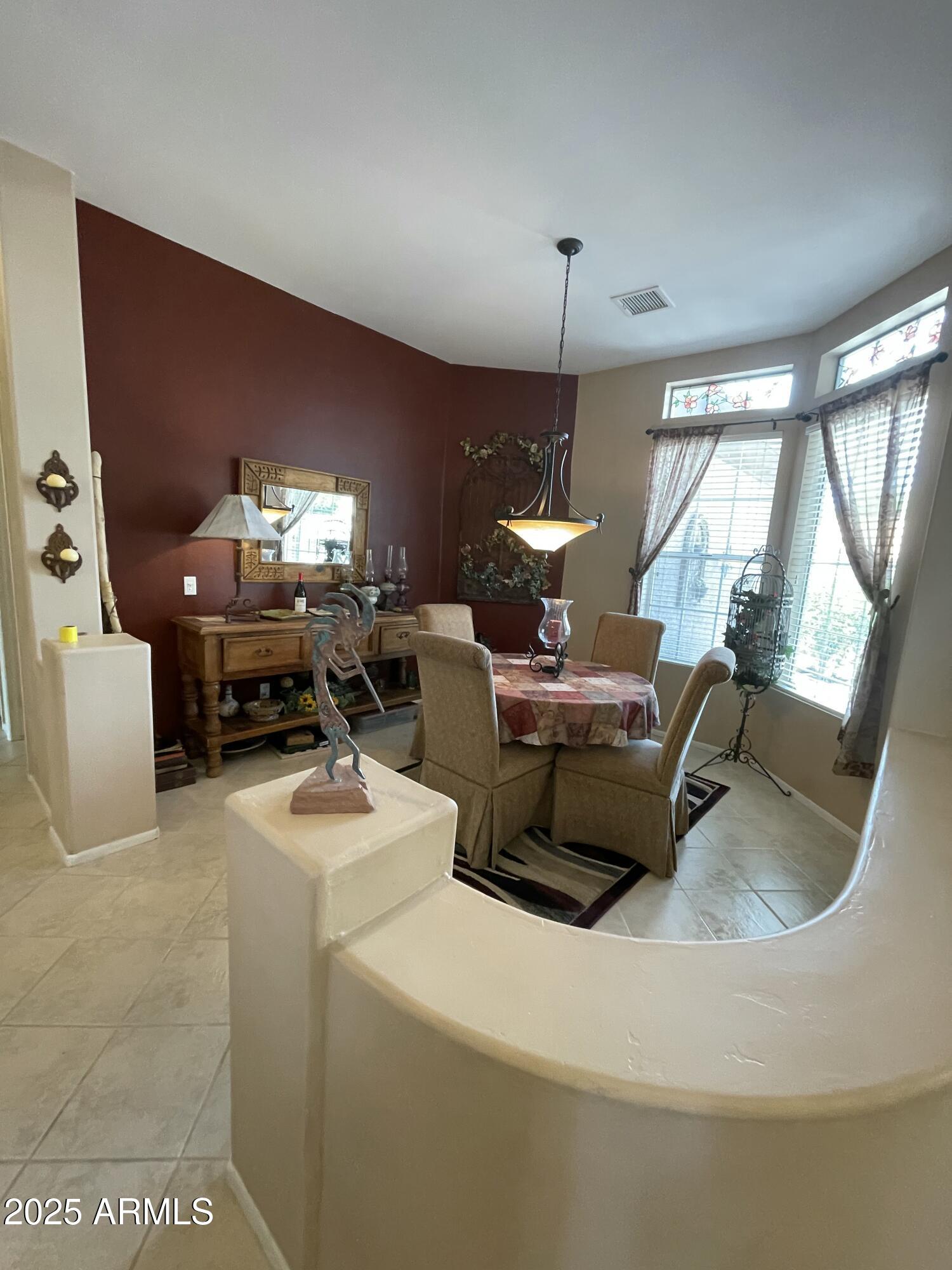 5325 Whisper Ridge Cornville, AZ 86325 - Photo 17 of 54 a living room with furniture and a chandelier