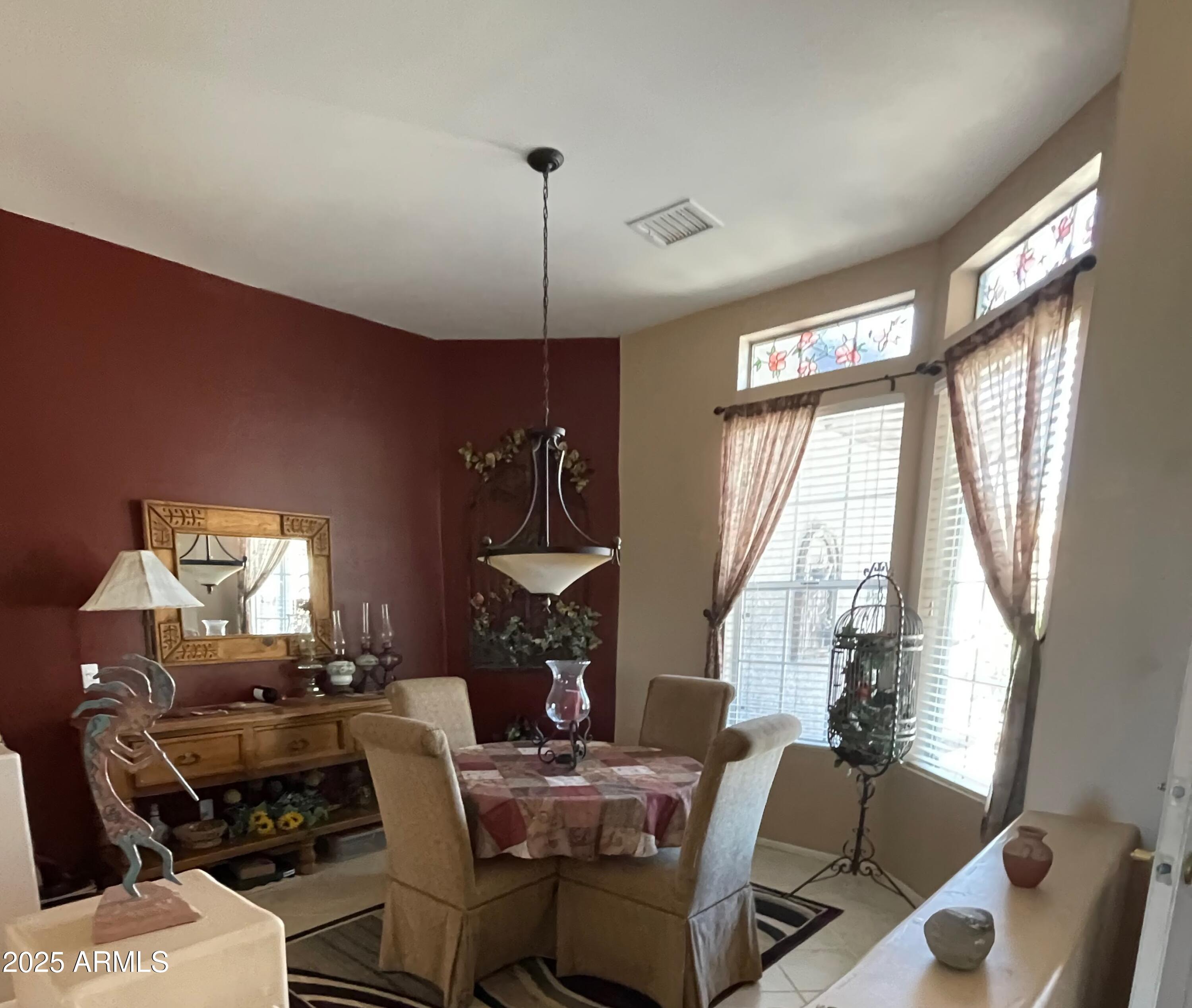 5325 Whisper Ridge Cornville, AZ 86325 - Photo 18 of 54 a living room with furniture a fireplace and a large window