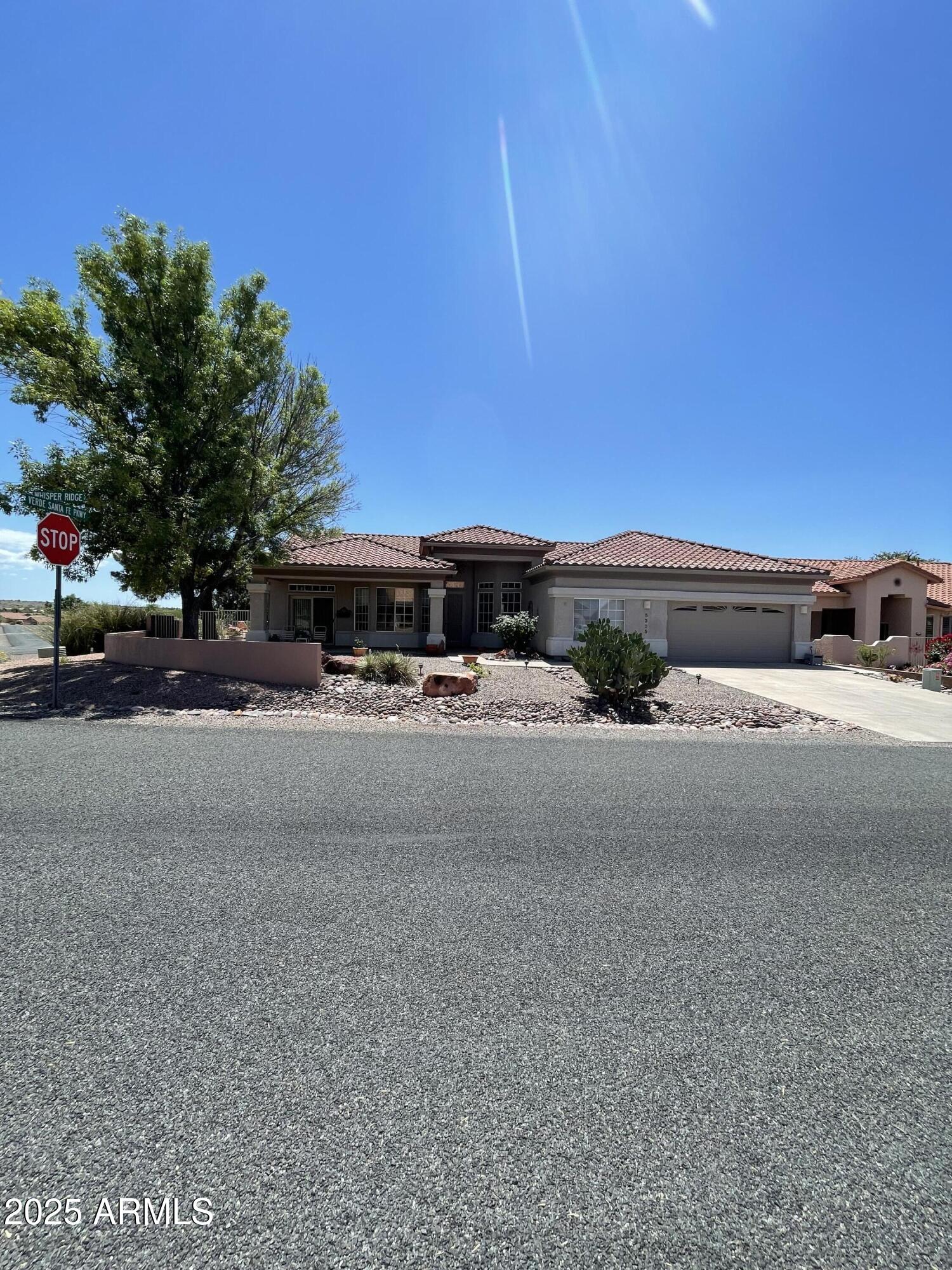 5325 Whisper Ridge Cornville, AZ 86325 - Photo 2 of 54 a car parked on the side of the road