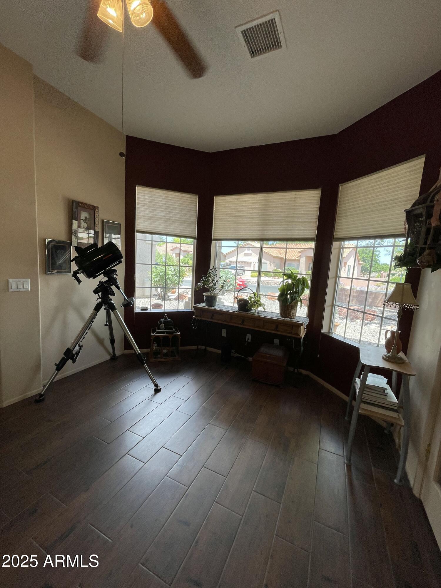 5325 Whisper Ridge Cornville, AZ 86325 - Photo 21 of 54 a living room with hard wood floors and a window