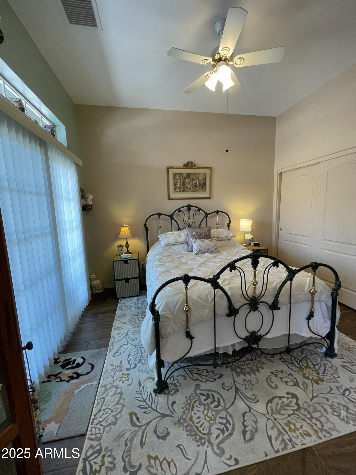 5325 Whisper Ridge Cornville, AZ 86325 - Photo 25 of 54 a bedroom with furniture and wooden floor