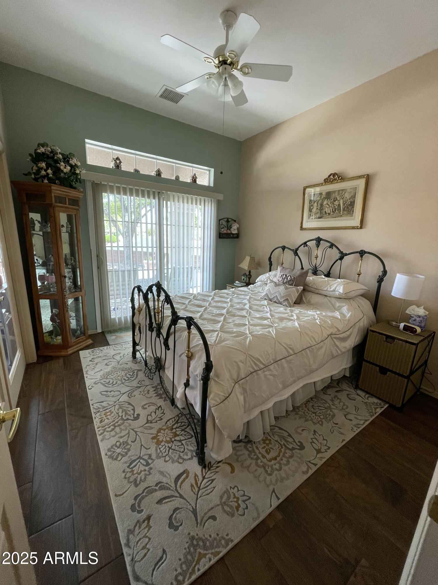 5325 Whisper Ridge Cornville, AZ 86325 - Photo 26 of 54 a bed sitting in a bedroom next to a window