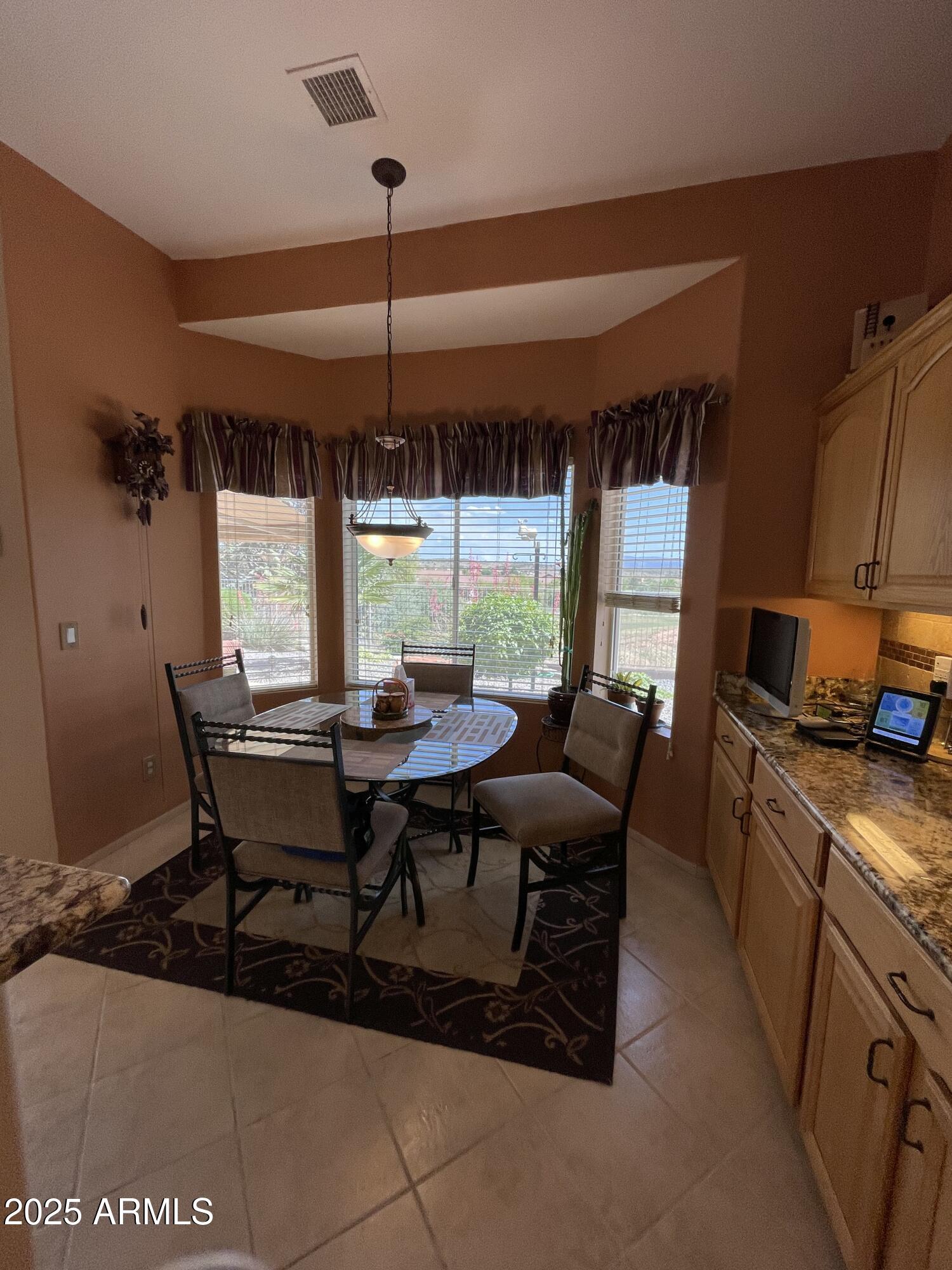 5325 Whisper Ridge Cornville, AZ 86325 - Photo 35 of 54 a view of a dining room with furniture window and outside view