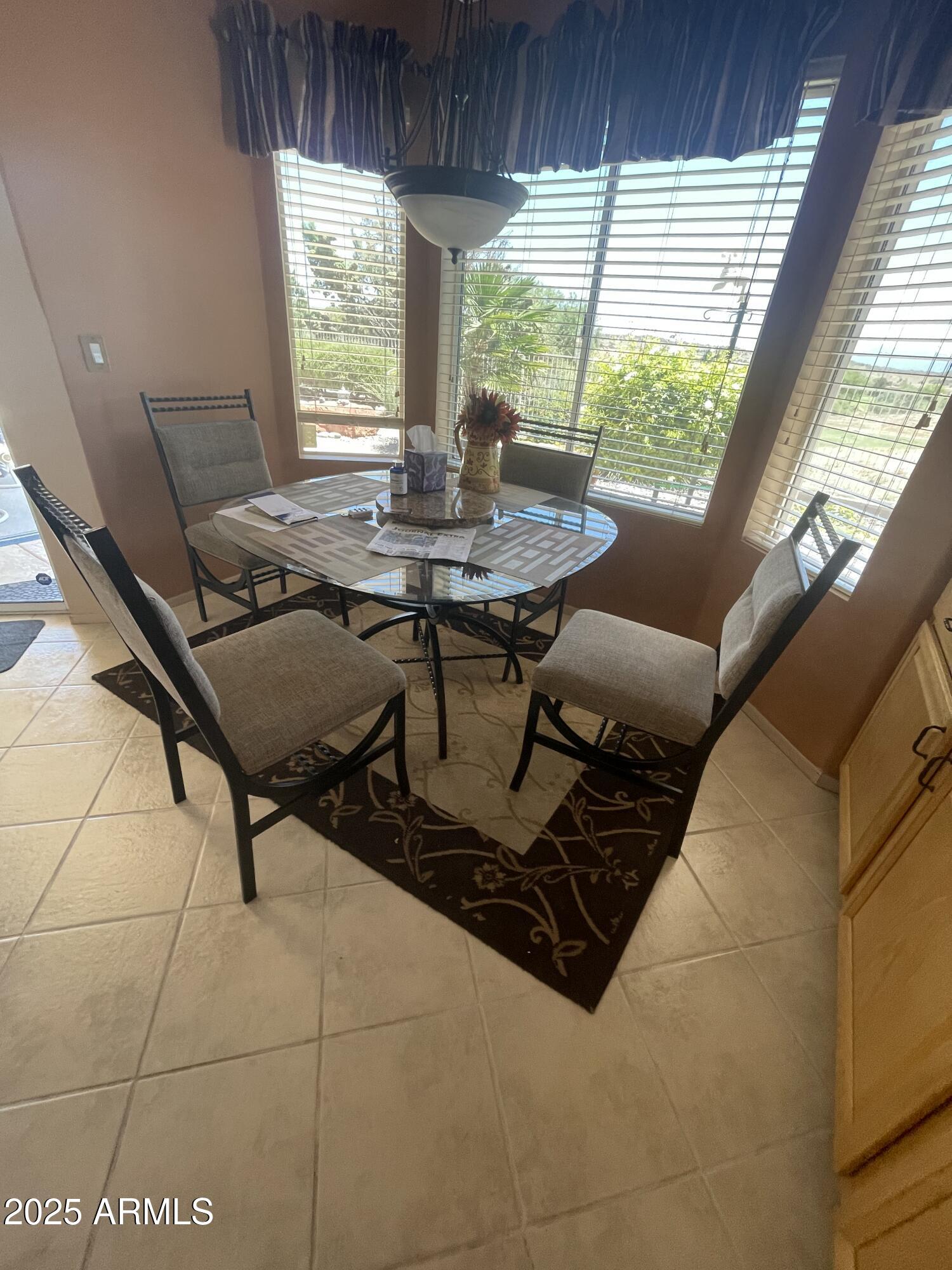 5325 Whisper Ridge Cornville, AZ 86325 - Photo 36 of 54 a view of a dining room with furniture window and outside view