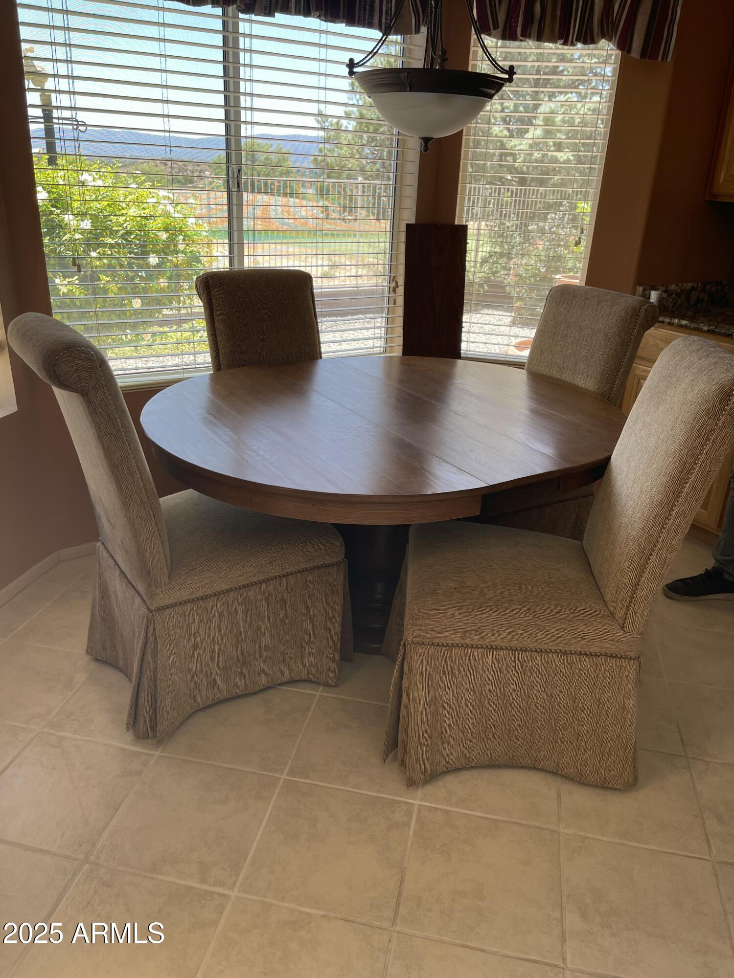 5325 Whisper Ridge Cornville, AZ 86325 - Photo 37 of 54 a view of a dining room with furniture and wooden floor