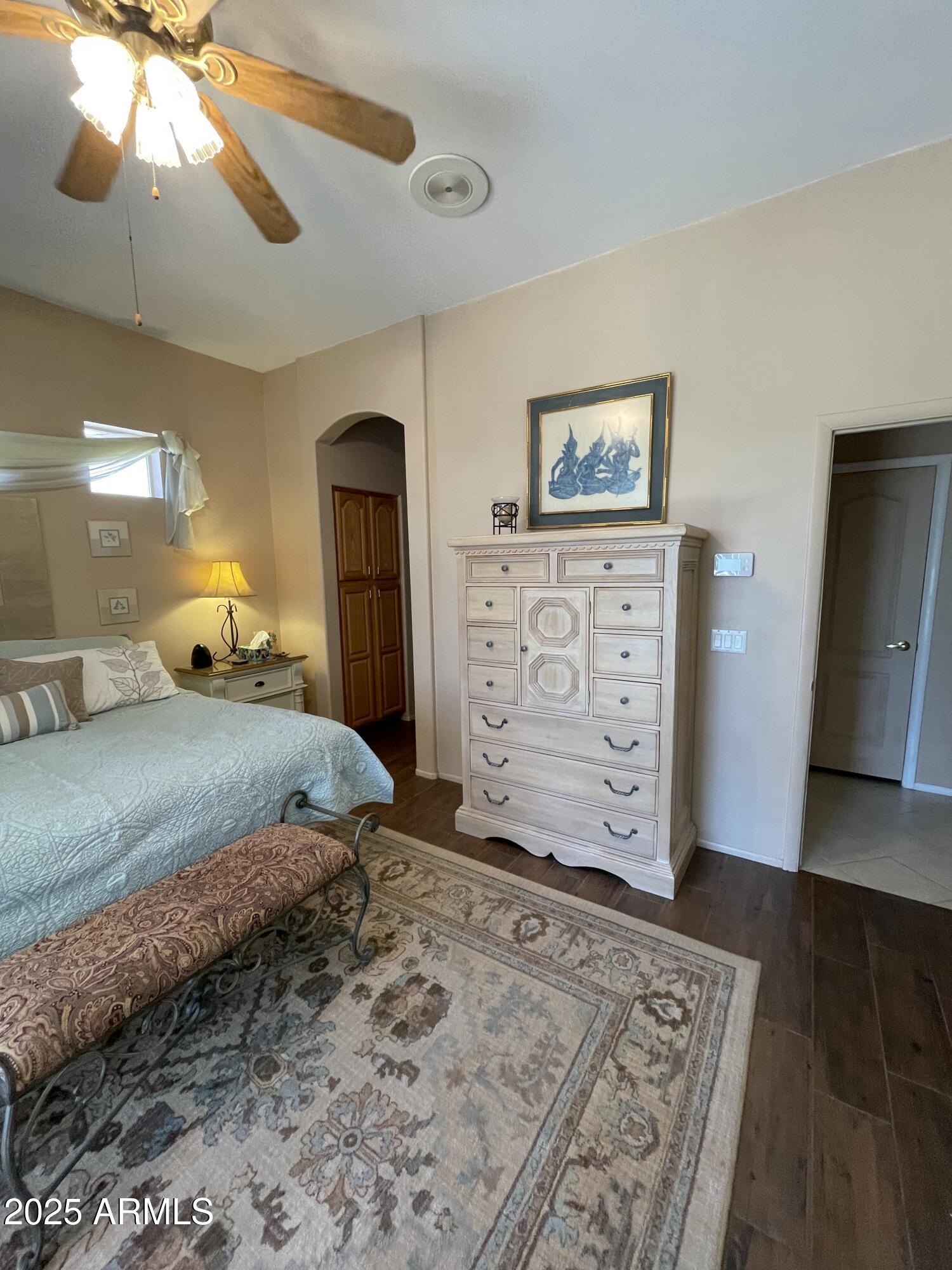 5325 Whisper Ridge Cornville, AZ 86325 - Photo 39 of 54 a bedroom with a bed and a flat screen tv