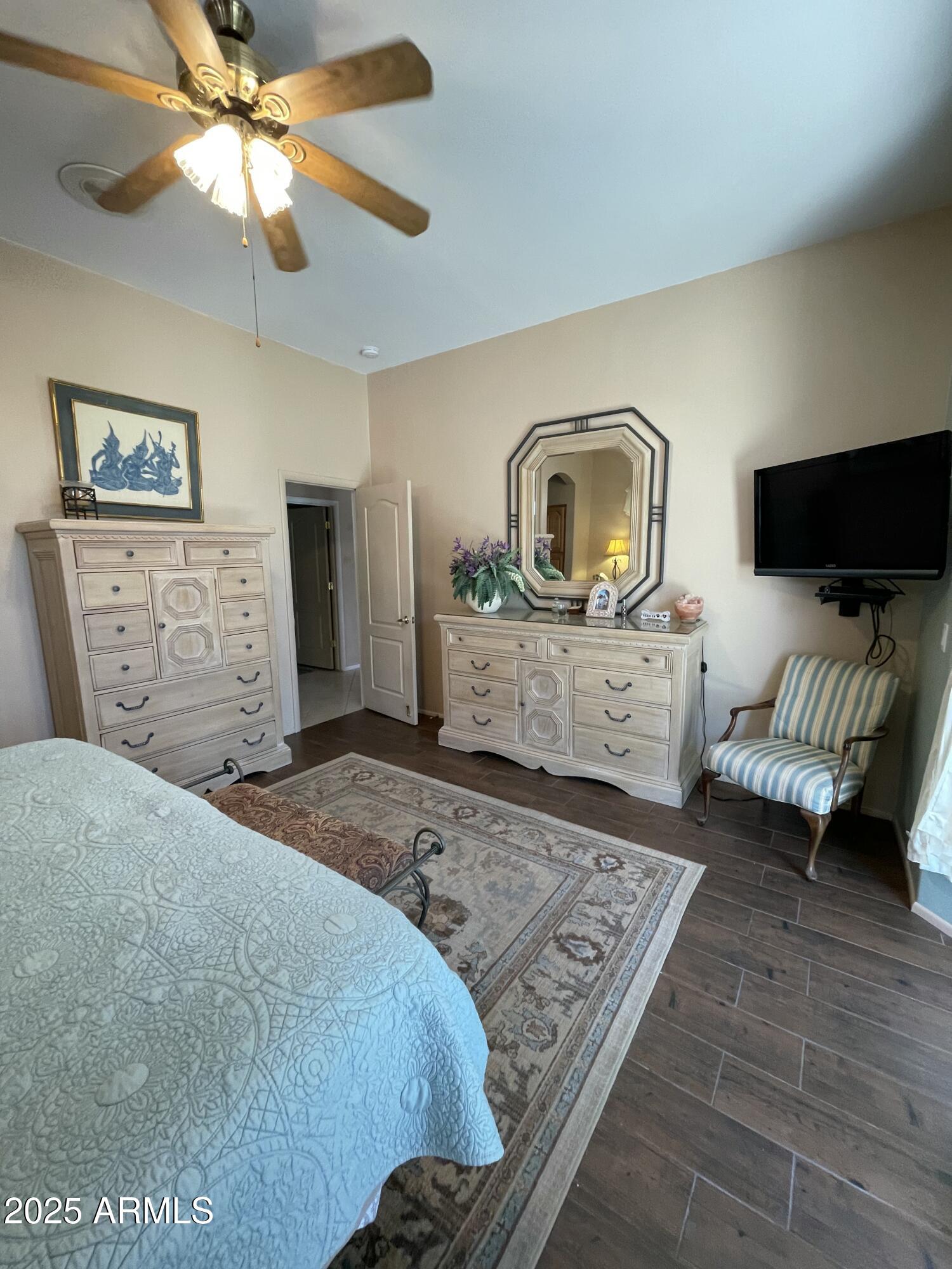 5325 Whisper Ridge Cornville, AZ 86325 - Photo 40 of 54 a bedroom with a bed and a television