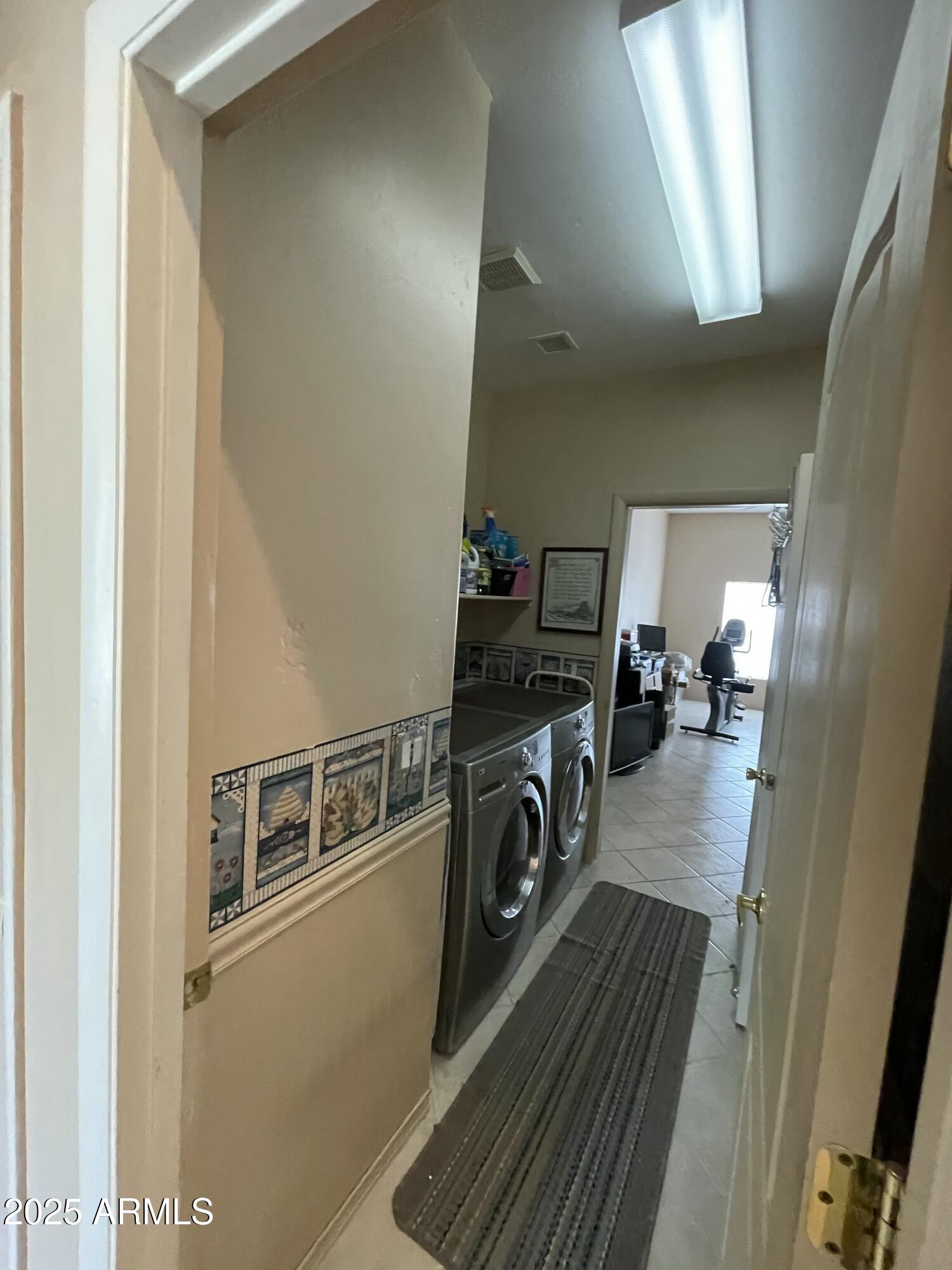 5325 Whisper Ridge Cornville, AZ 86325 - Photo 51 of 54 a utility room with dryer and washer