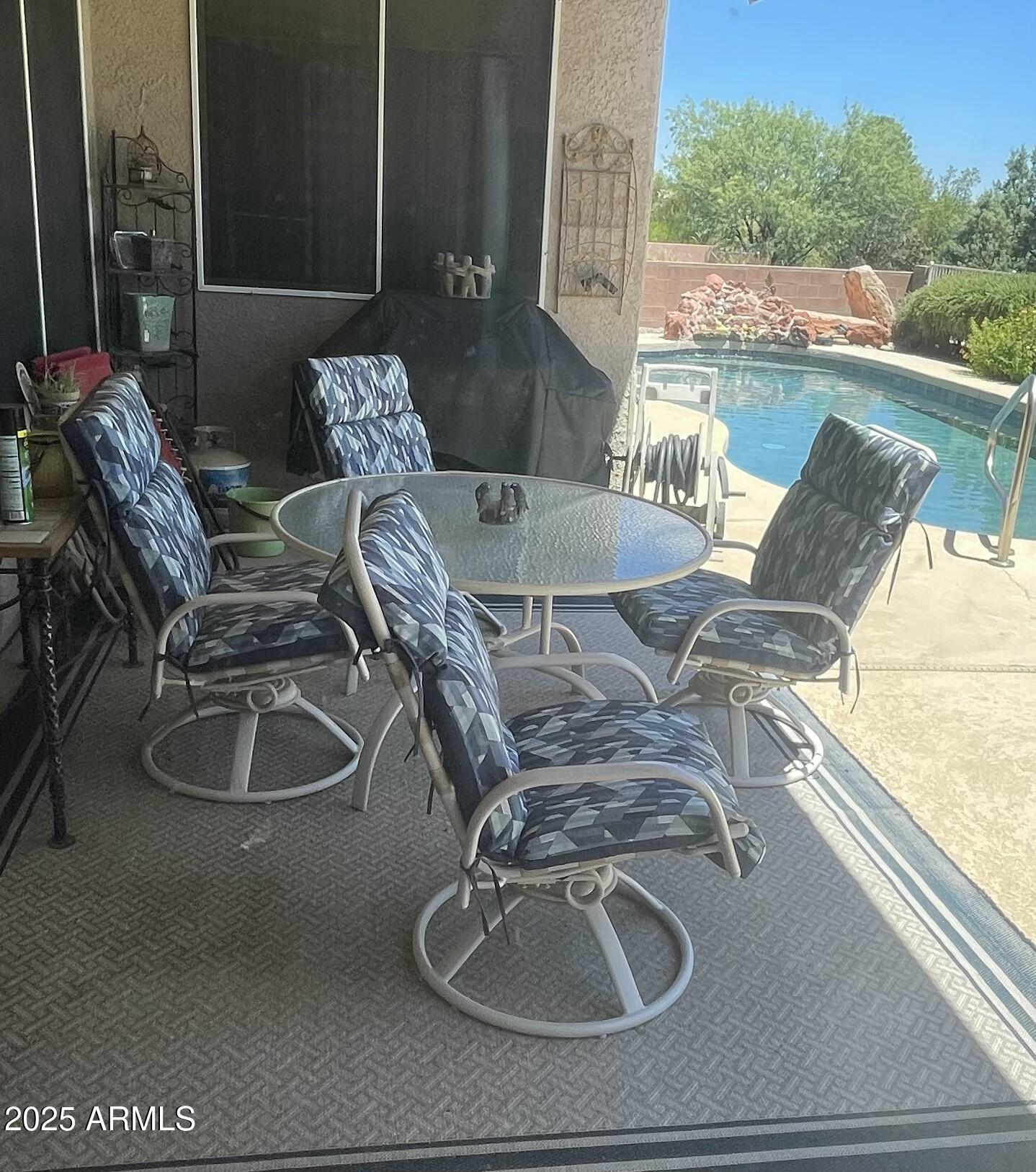 5325 Whisper Ridge Cornville, AZ 86325 - Photo 7 of 54 a view of a patio with table and chairs