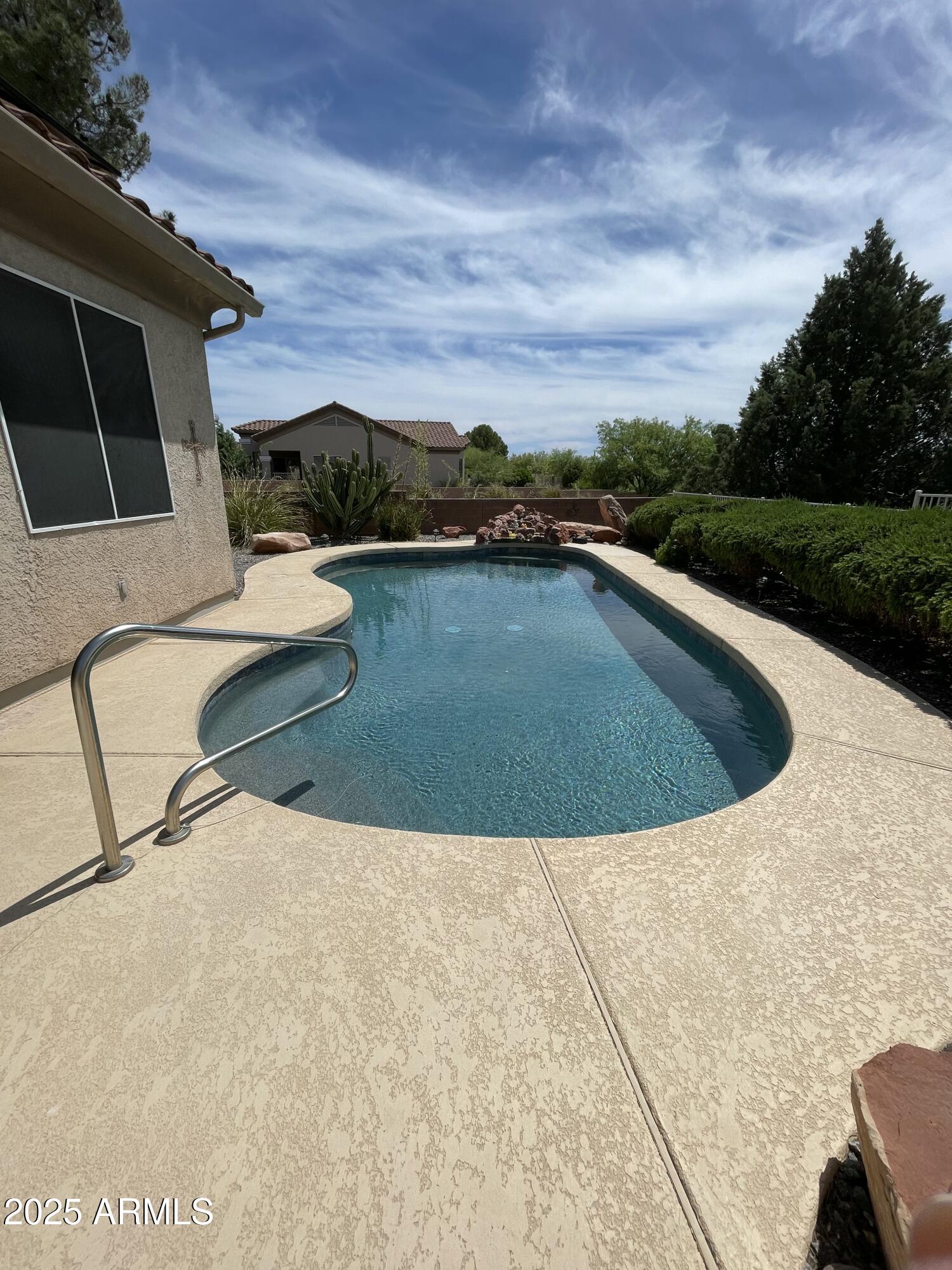 5325 Whisper Ridge Cornville, AZ 86325 - Photo 10 of 54 a view of a swimming pool with a yard