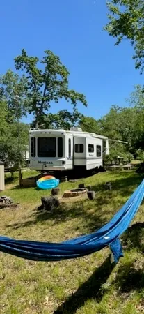 a view of a swimming pool with a yard