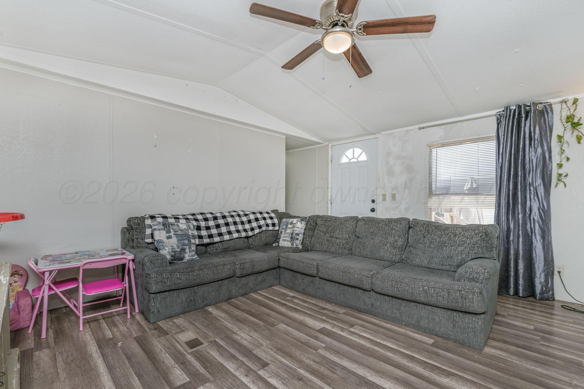 2115 Country Lane Amarillo, TX 79118 - Photo 6 of 15 a living room with furniture