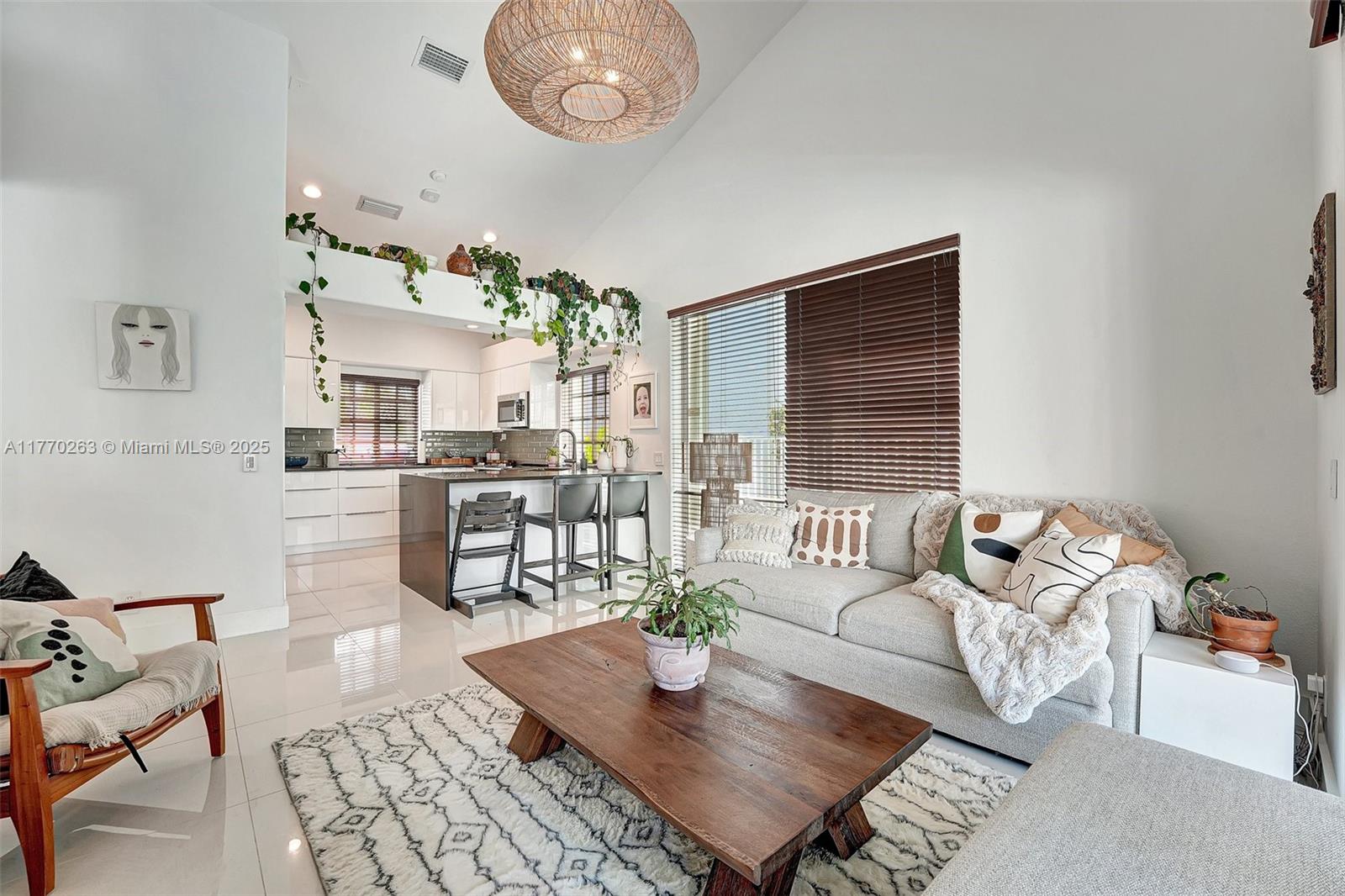 1055 San Luis Rey Weston, FL 33326 - Photo 20 of 75 a living room with fireplace furniture and a table