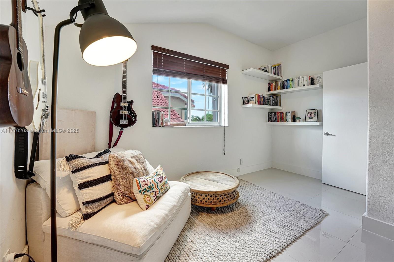 1055 San Luis Rey Weston, FL 33326 - Photo 38 of 75 a living room with furniture and a rug