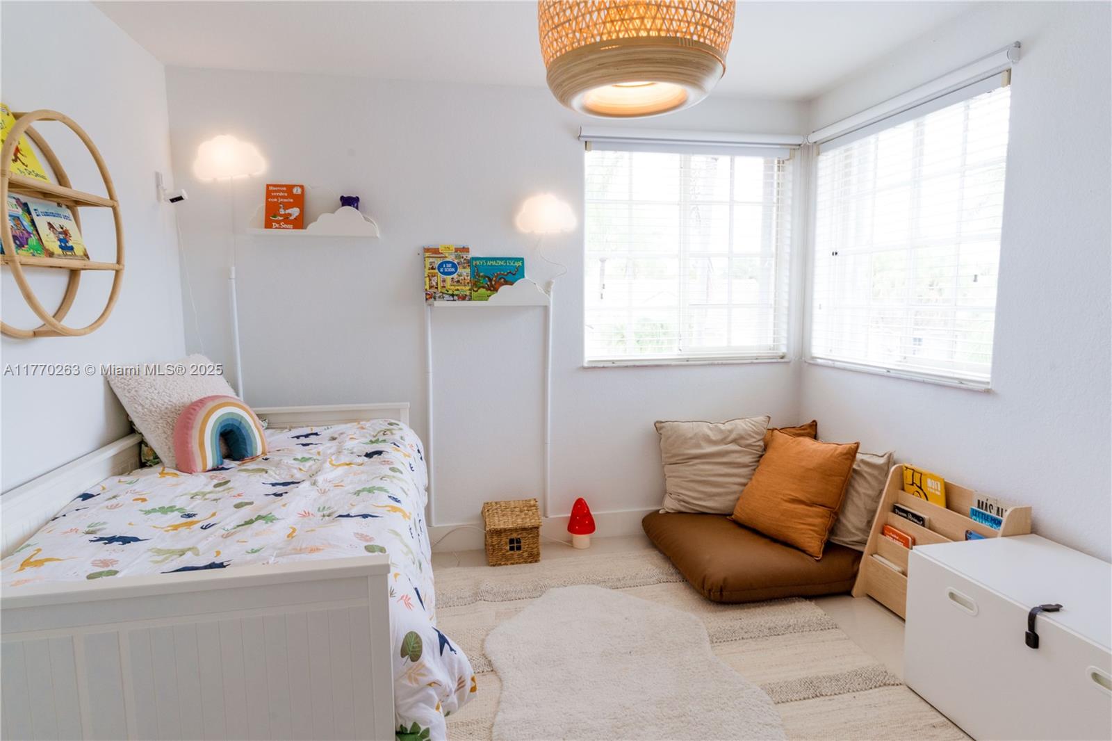 1055 San Luis Rey Weston, FL 33326 - Photo 41 of 75 a bedroom with a bed and a window