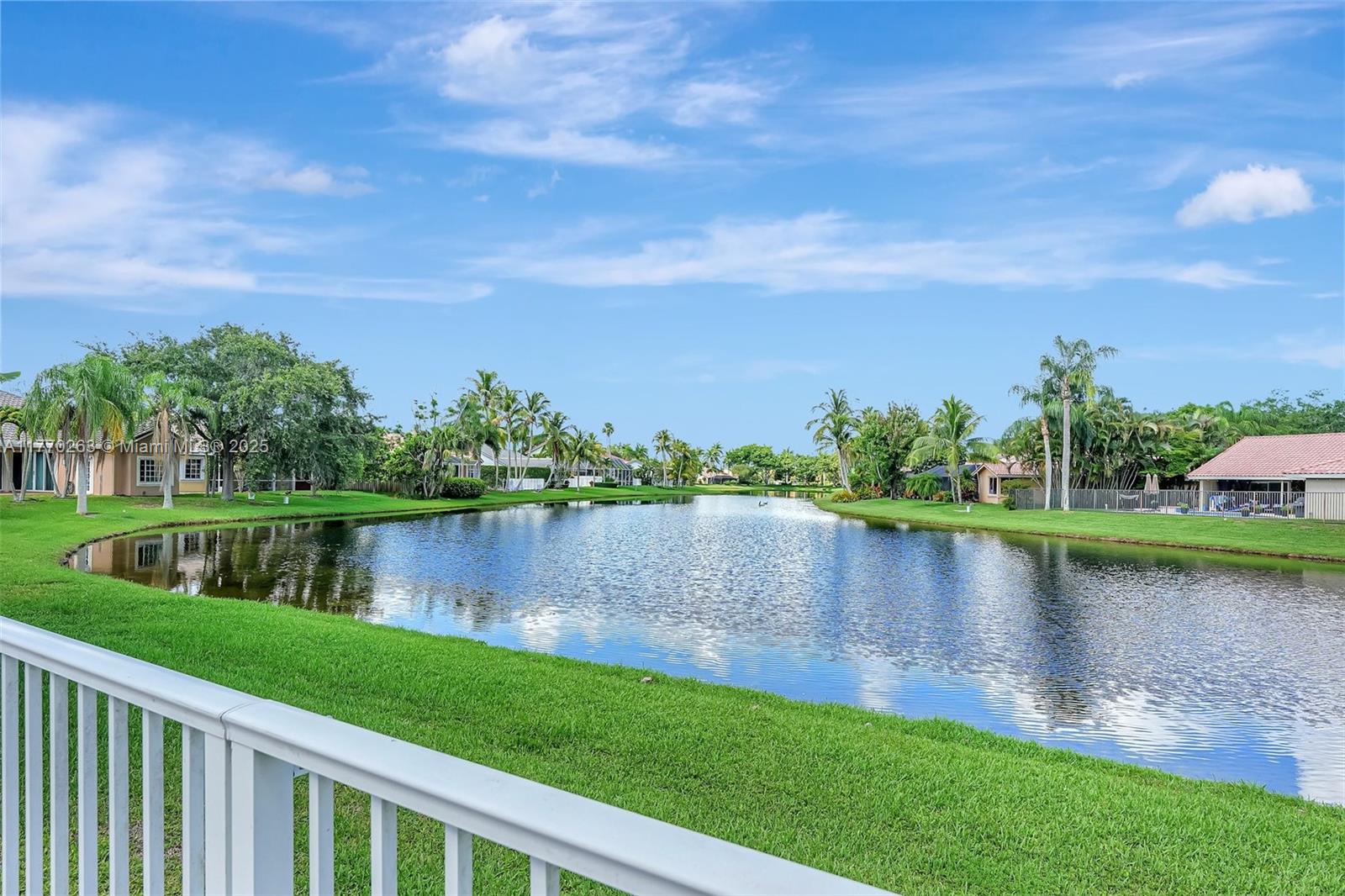 1055 San Luis Rey Weston, FL 33326 - Photo 54 of 75 a view of a lake with a city view