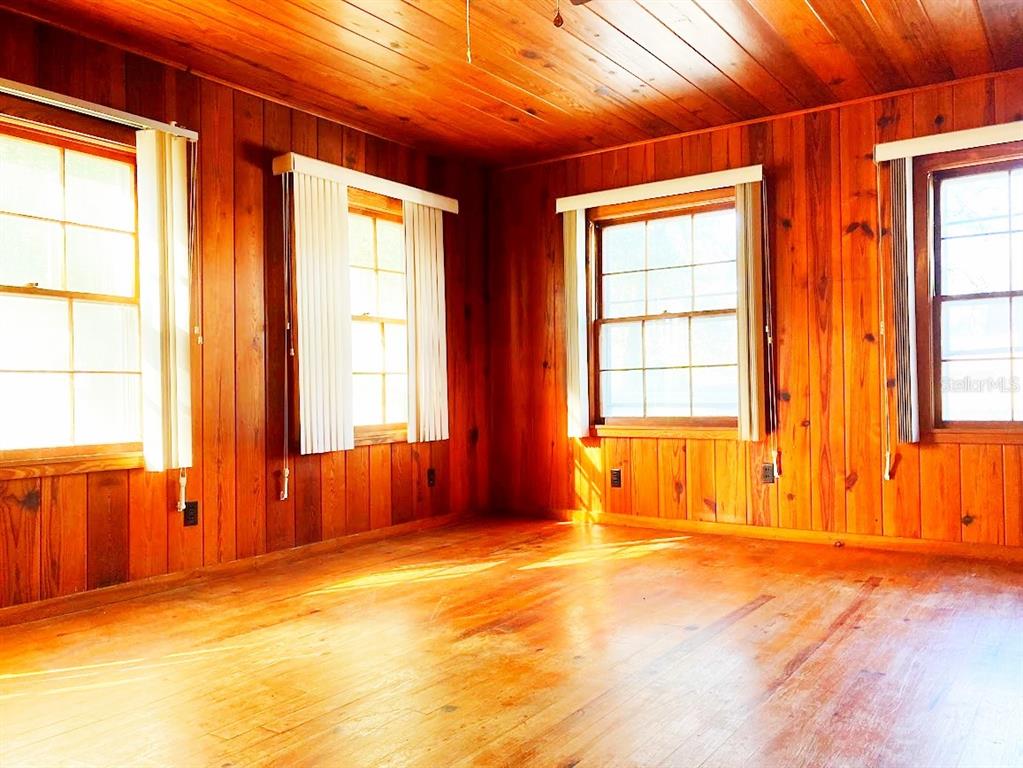 125 Southwest 6th Street Lake Butler, FL 32054 - Photo 11 of 23 an empty room with a window and a bathtub