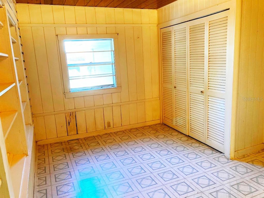 125 Southwest 6th Street Lake Butler, FL 32054 - Photo 13 of 23 an empty room with a window