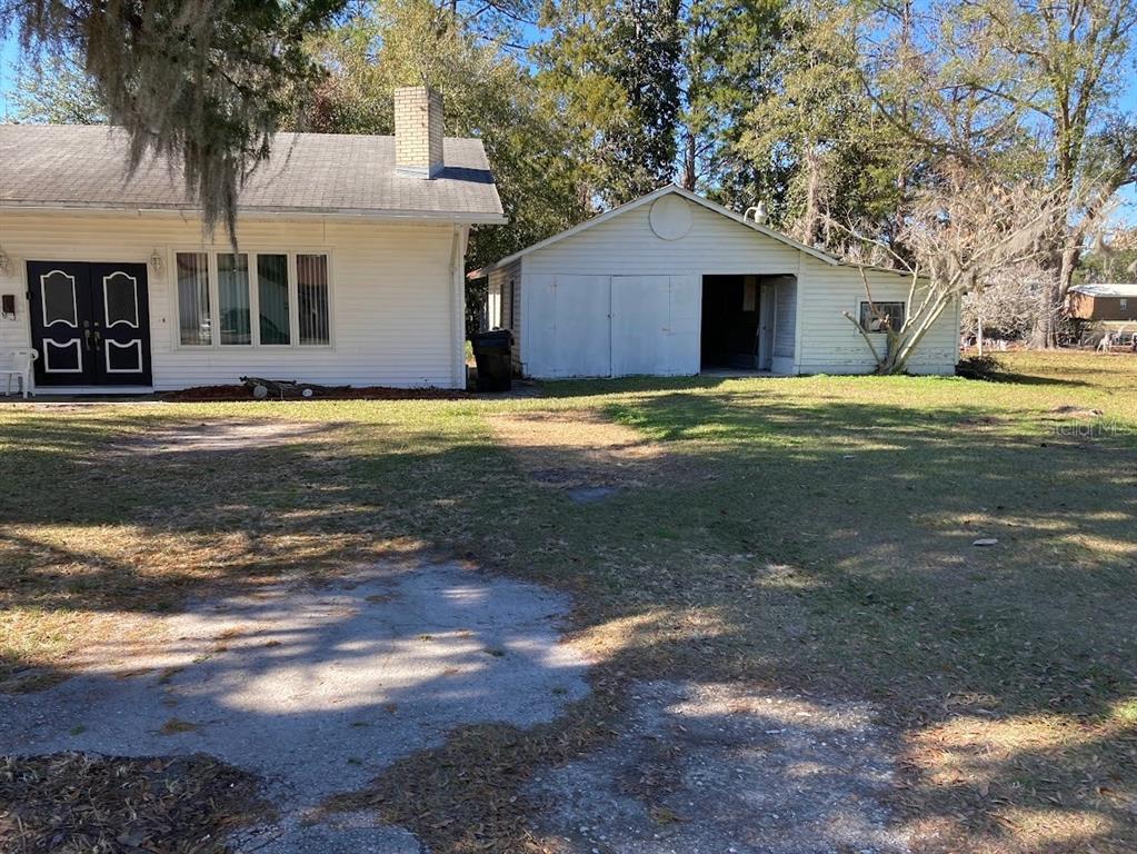 125 Southwest 6th Street Lake Butler, FL 32054 - Photo 21 of 23 a view of a house with a yard