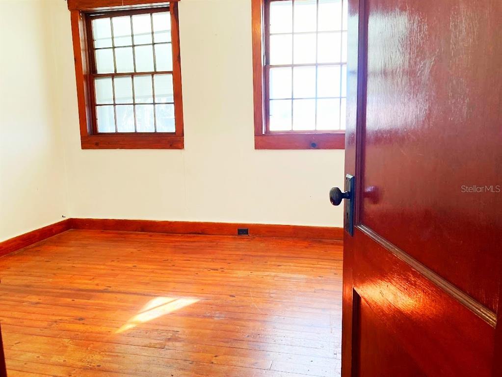 125 Southwest 6th Street Lake Butler, FL 32054 - Photo 5 of 23 a view of an empty room and window