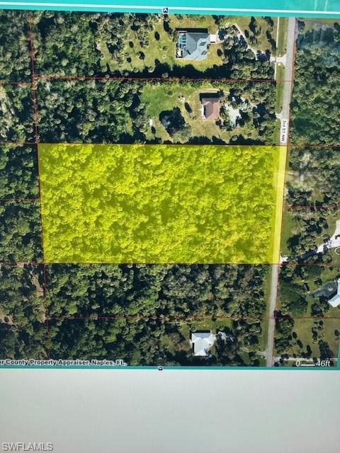 3rd Street Northwest Naples, FL 34120 - Photo 3 of 3 a view of a back yard of the garden