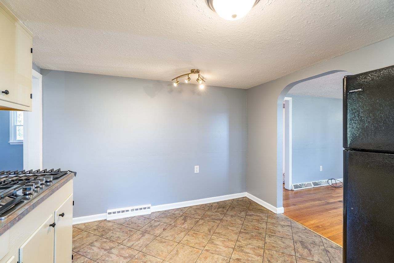 418 G Street Staunton, VA 24401 - Photo 11 of 31 a view of a kitchen with a sink and a stove top oven