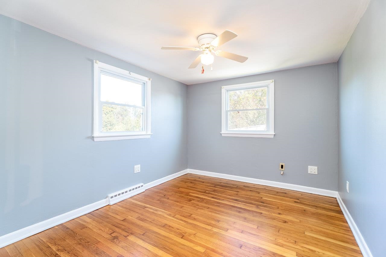 418 G Street Staunton, VA 24401 - Photo 12 of 31 a view of an empty room with window and wooden floor