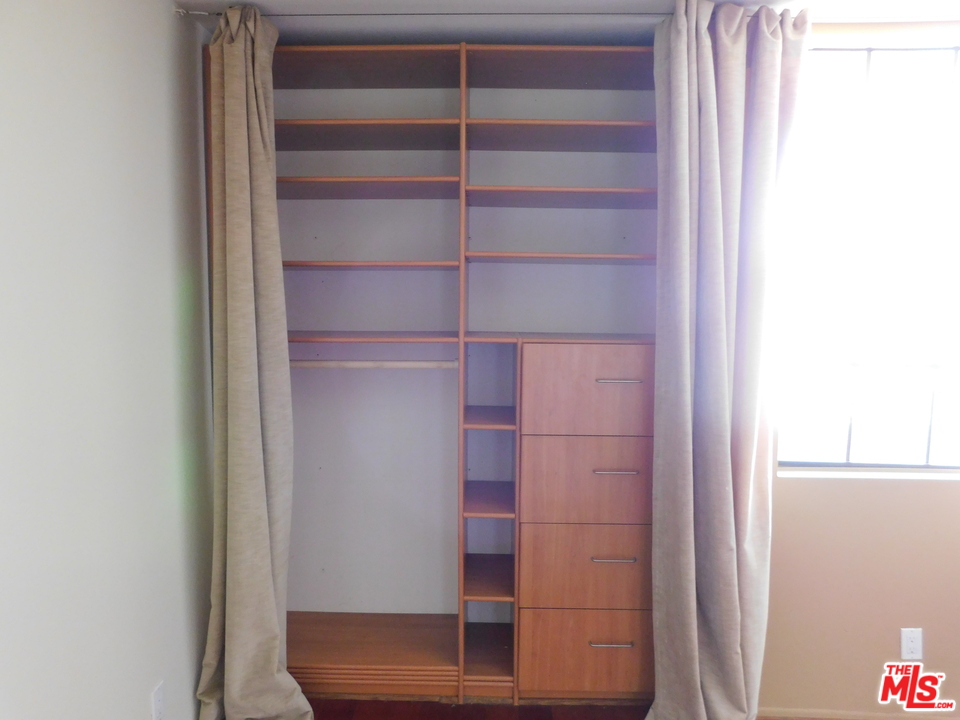 740 North Kings Road, Unit 201 Los Angeles, CA 90069 - Photo 14 of 20 a view of walk in closet