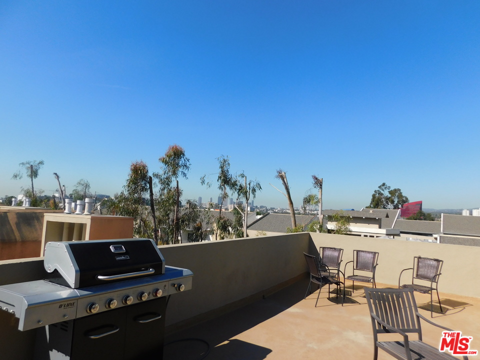740 North Kings Road, Unit 201 Los Angeles, CA 90069 - Photo 17 of 20 a view of a workspace with a window