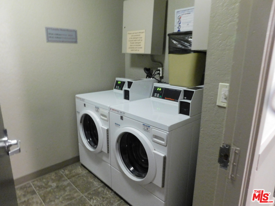 740 North Kings Road, Unit 201 Los Angeles, CA 90069 - Photo 19 of 20 a utility room with dryer and washer